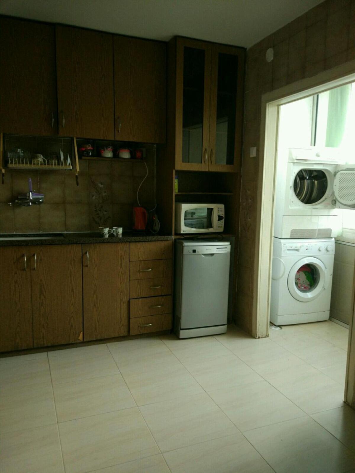 Three-Bedroom Apartment - Photo 12