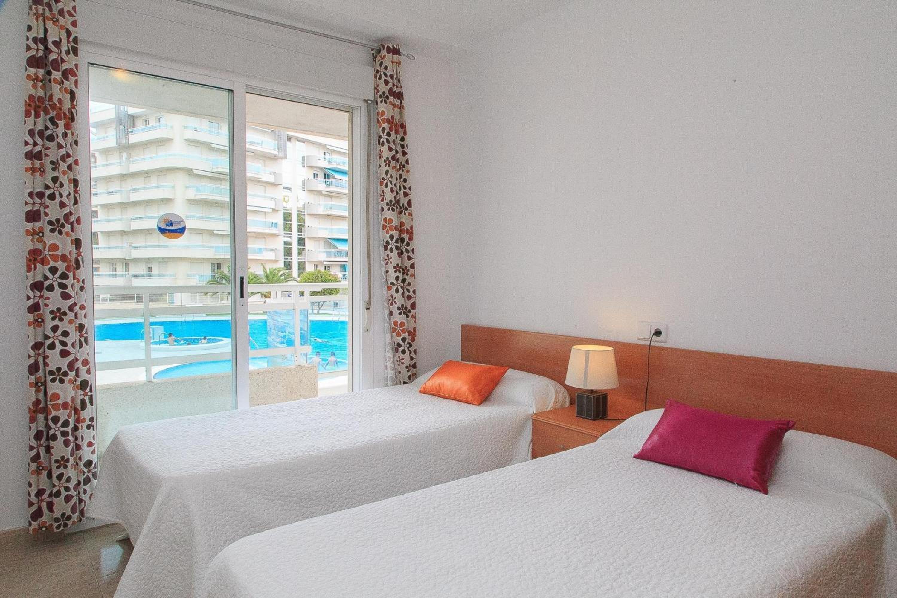 Three-Bedroom Apartment with swimming pool view photo 2