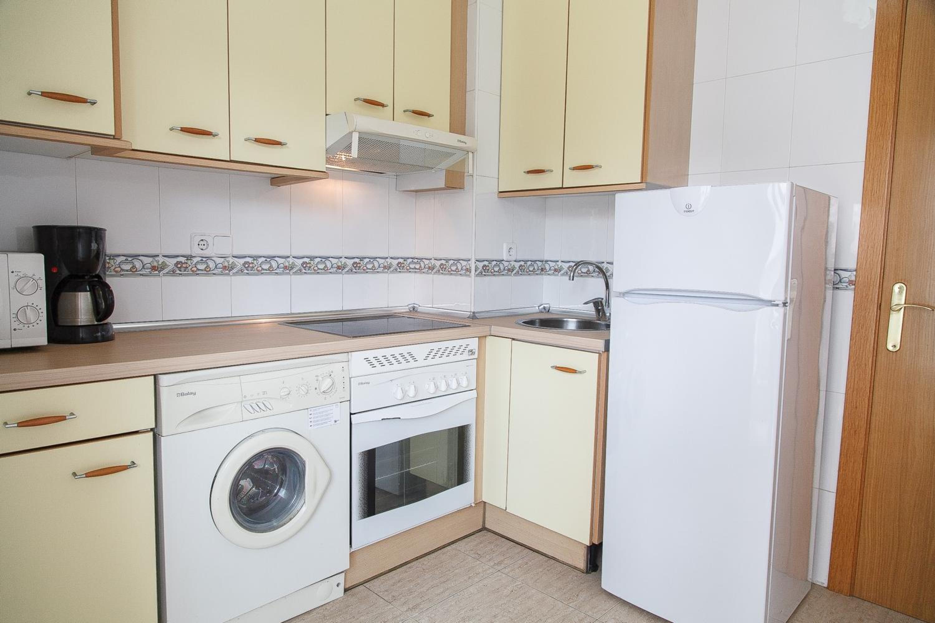 Three-Bedroom Apartment with swimming pool view photo 1