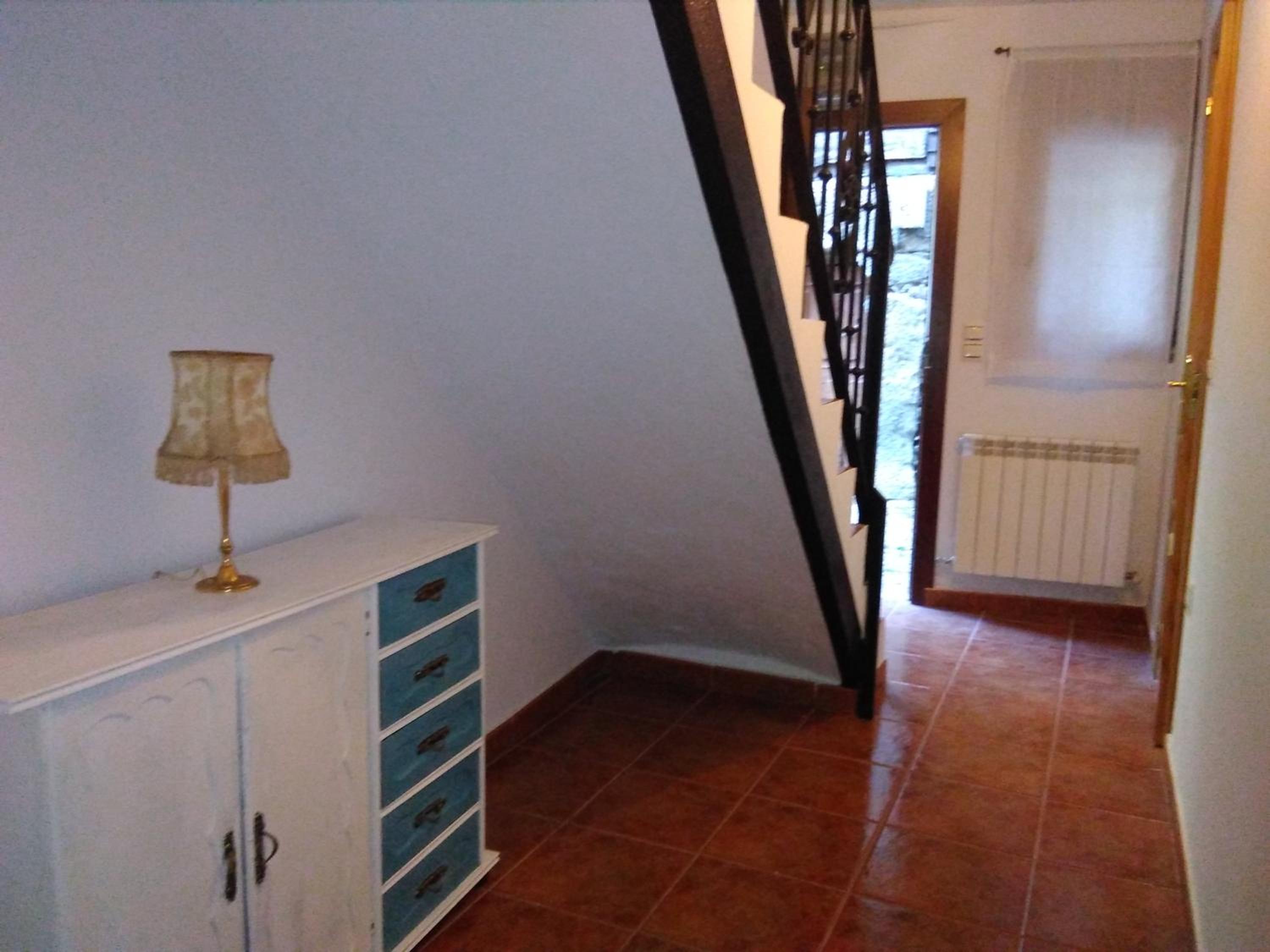 Casa de cuatro habitaciones