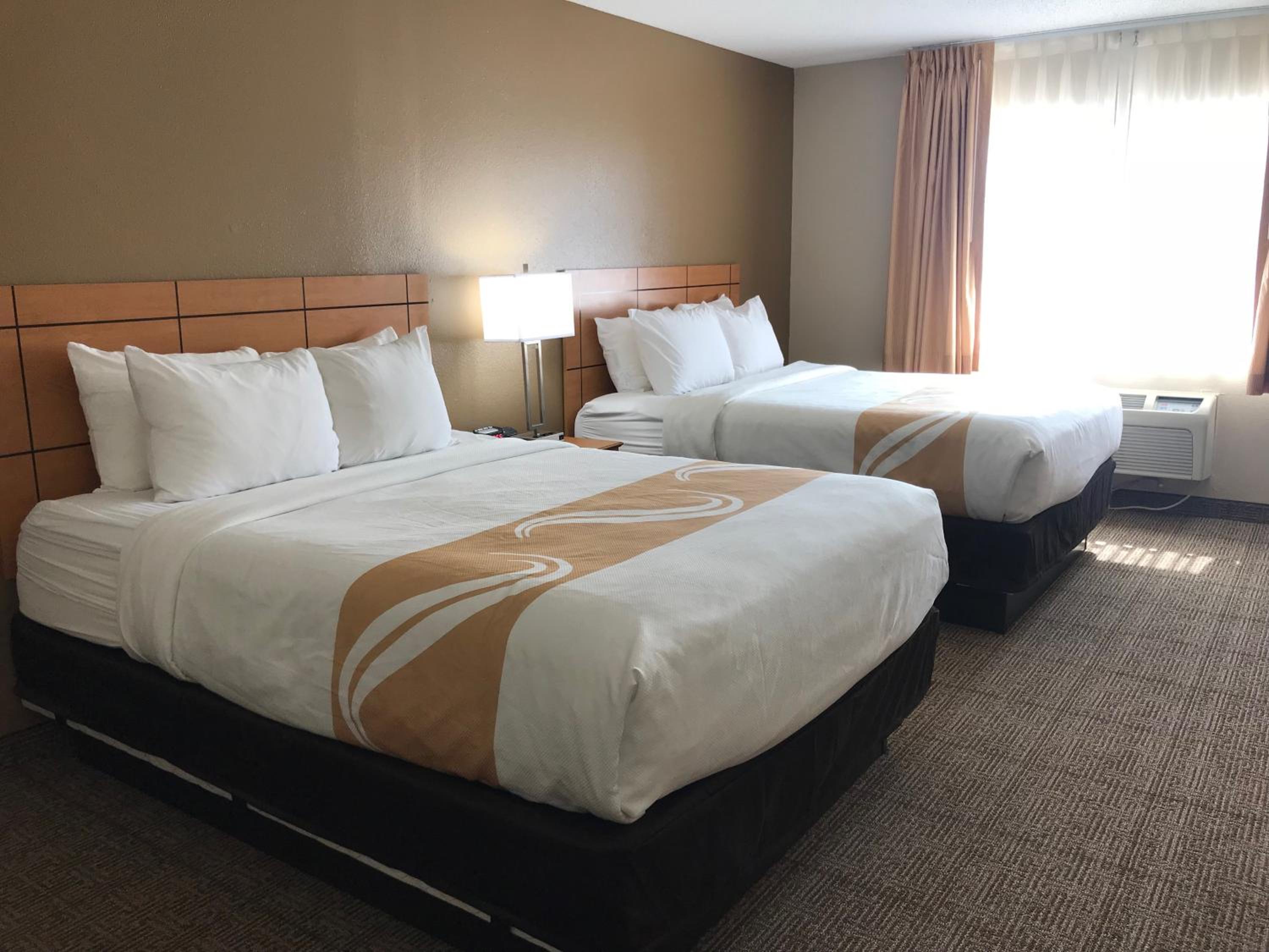 Queen Room with Two Queen Beds - Non-Smoking - Photo 1