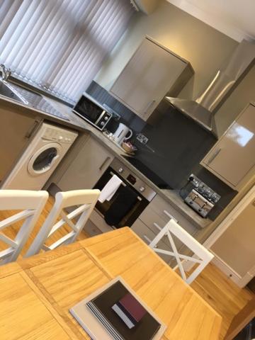 Three-Bedroom Apartment - Photo 18