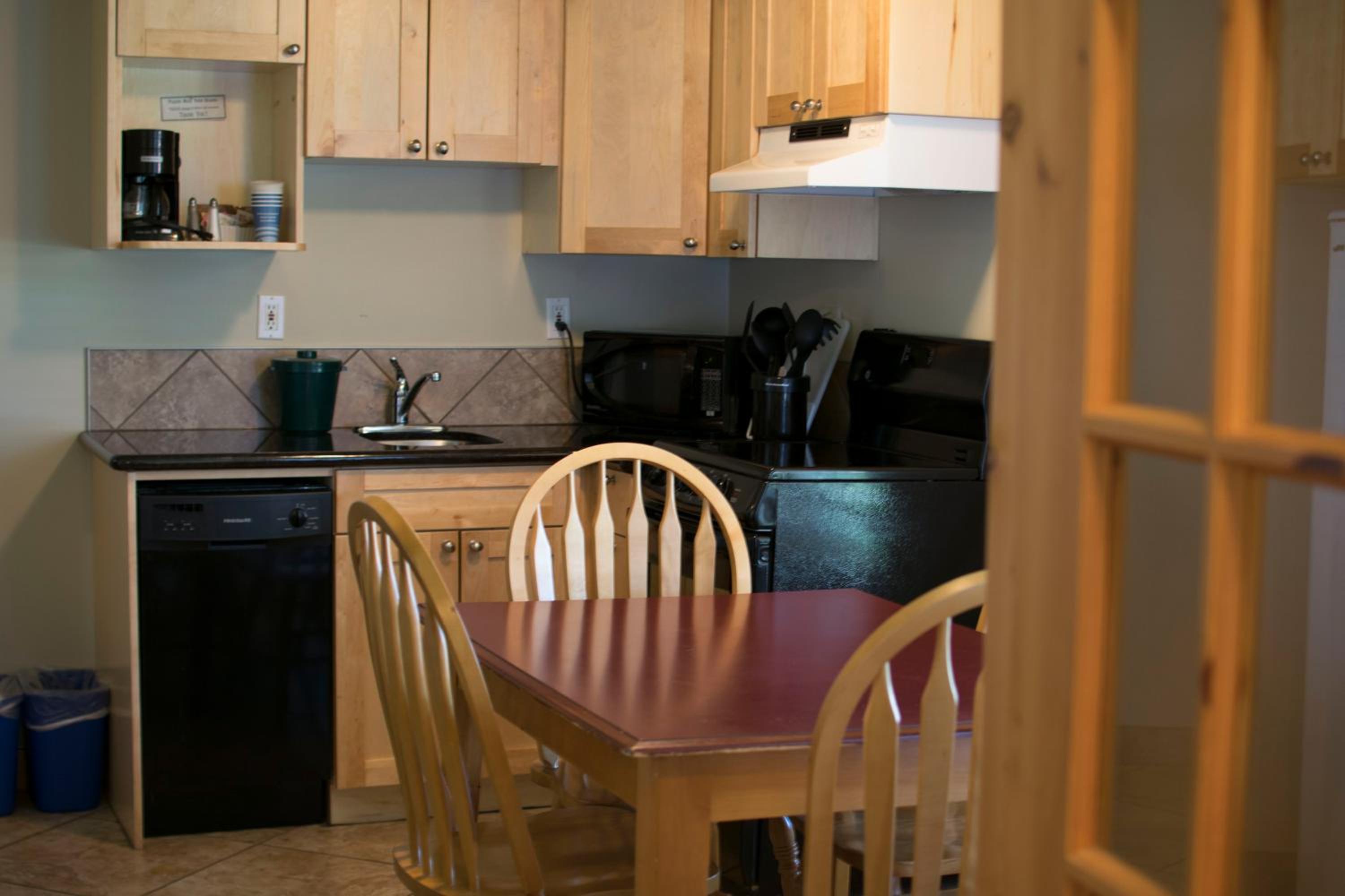Queen Room with Three Queen Beds and Kitchen photo 2