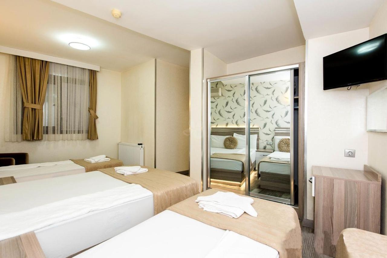 Standard Quadruple Room - Photo 6