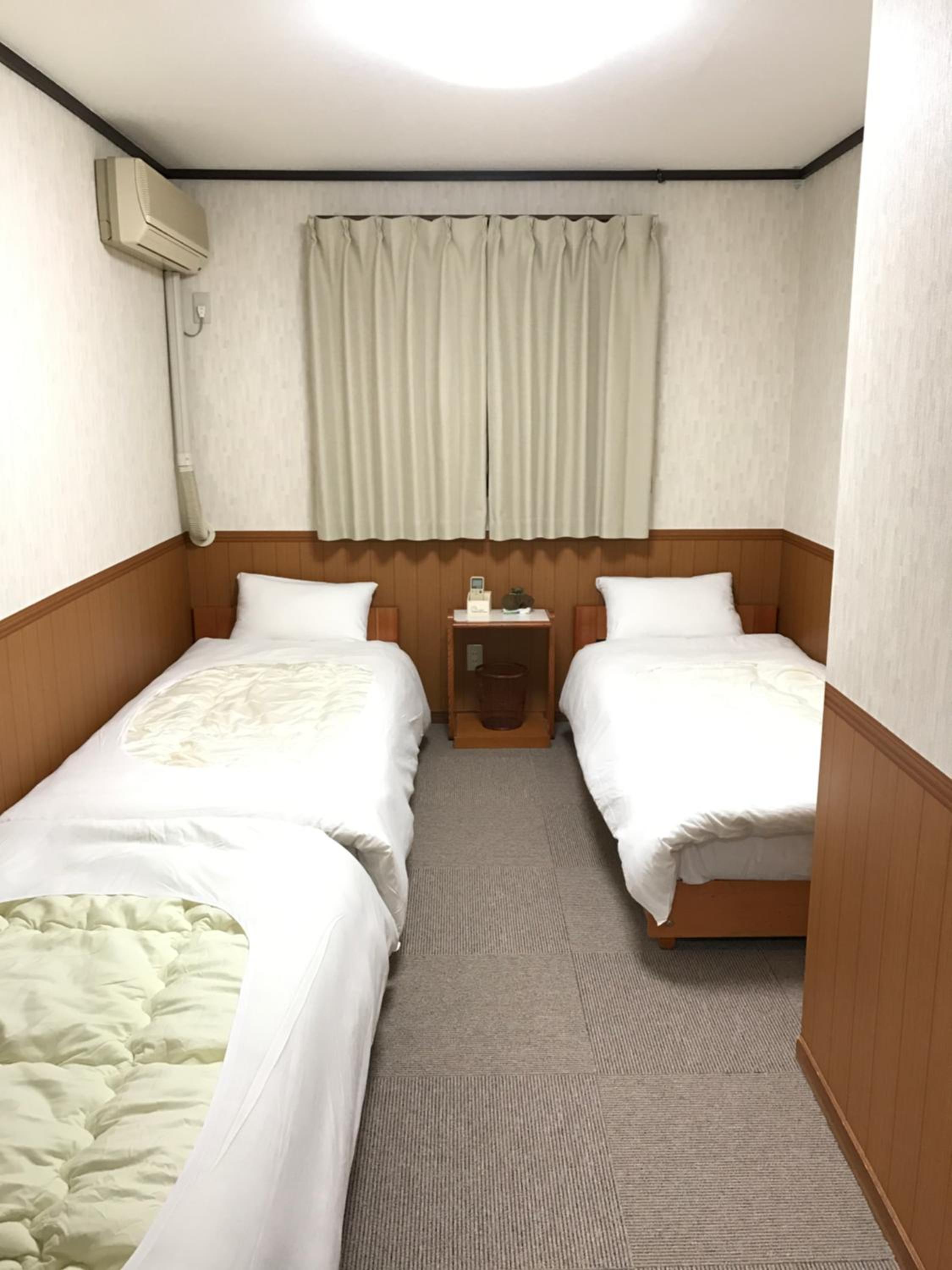Economy Triple Room - Photo 3
