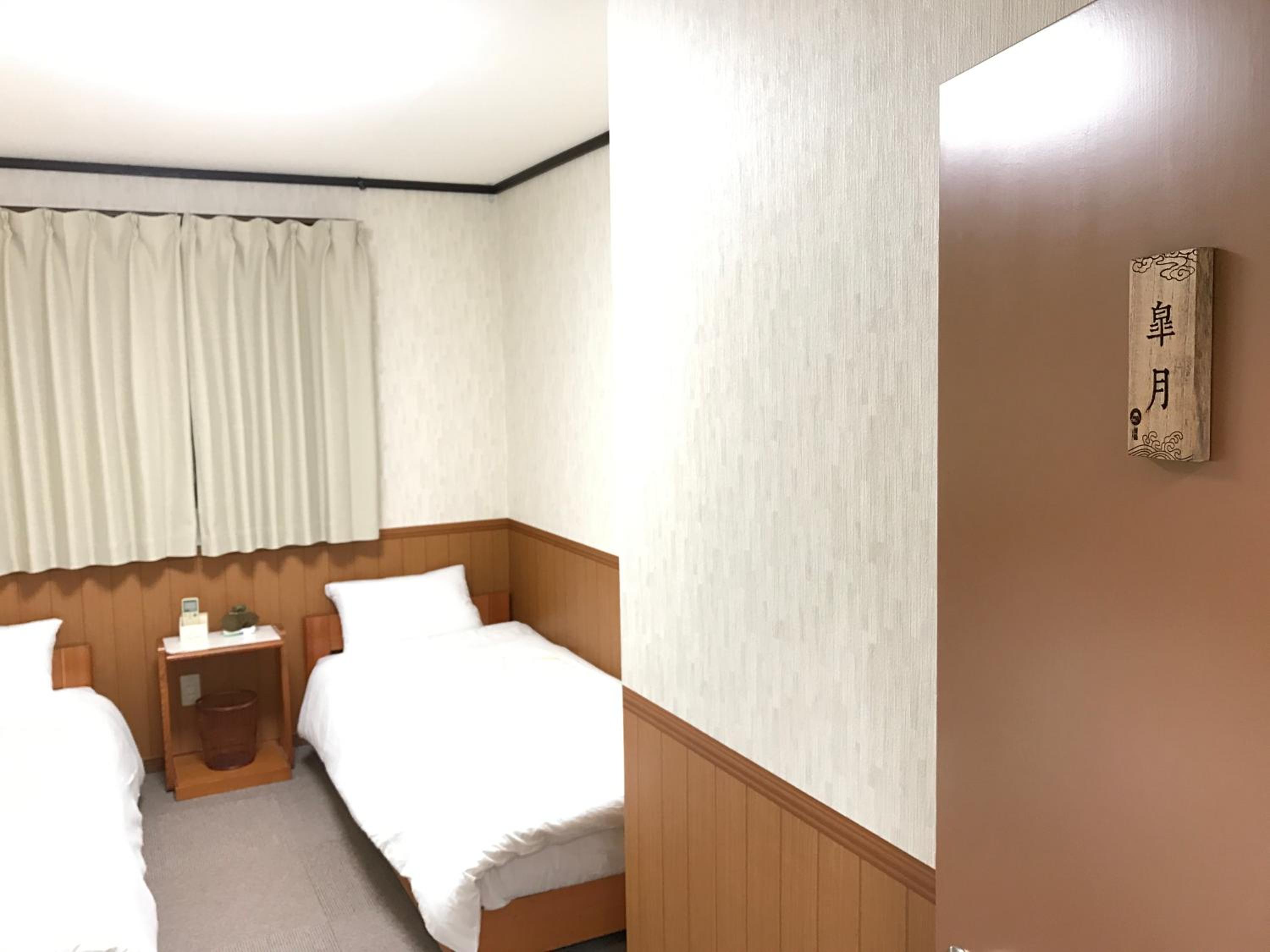 Economy Triple Room - Photo 2