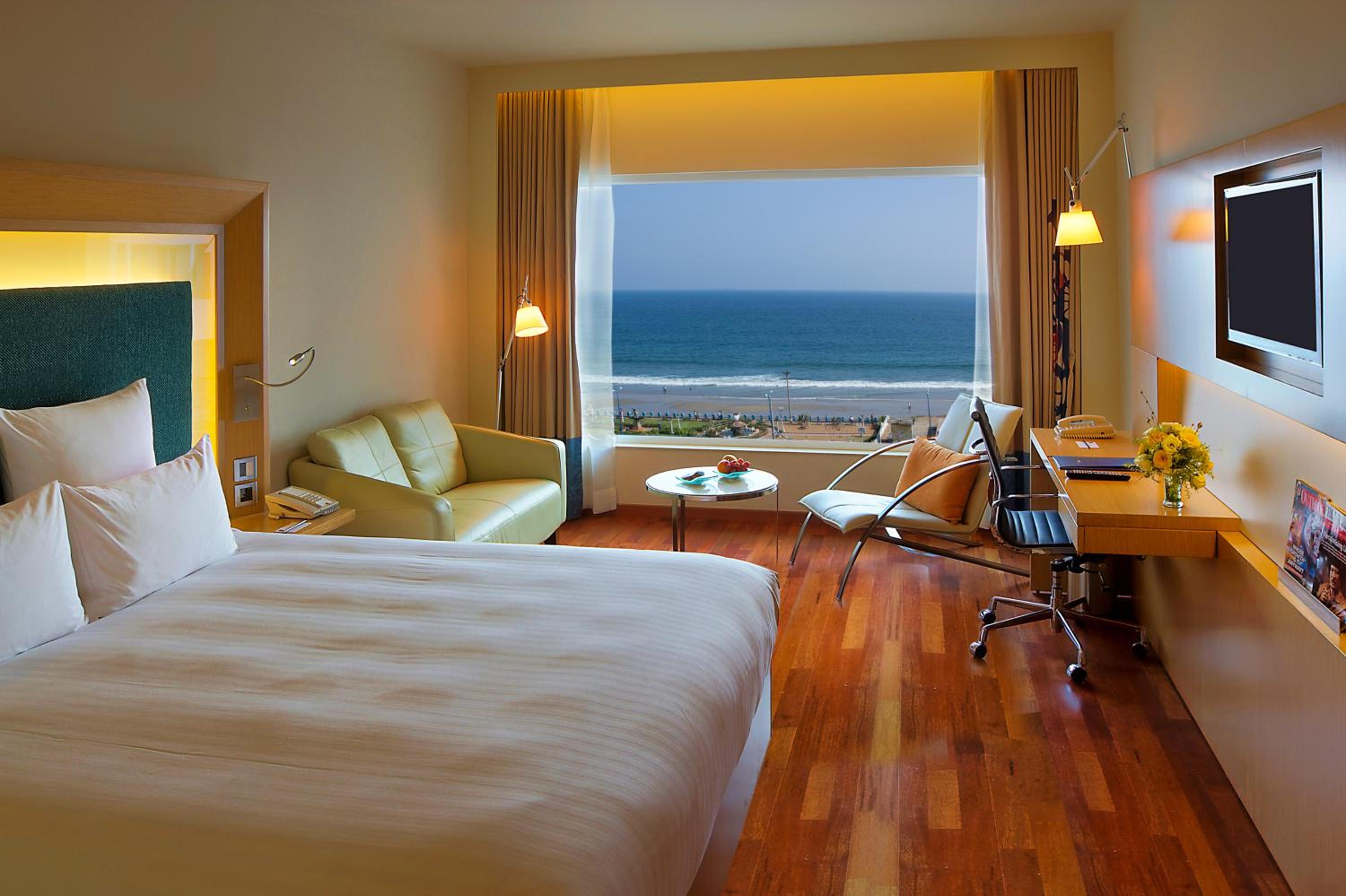 Premier Room with 1 King Bed Ocean View with Premier Lounge Access along with 2 Pieces of Laundry per room per night on non-cumulative basis.