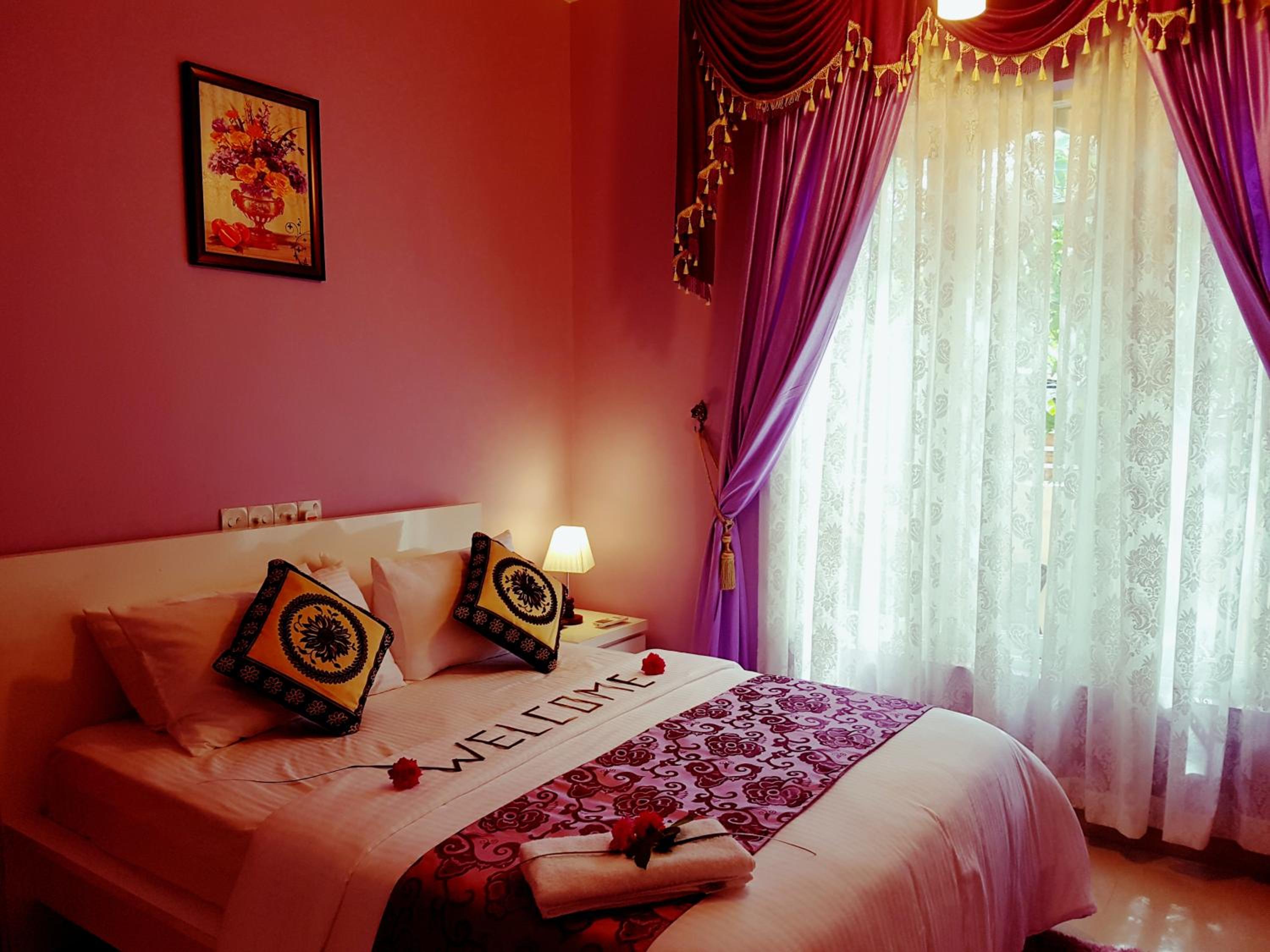 Deluxe Double Room (2 Adults + 1 Child) photo 2