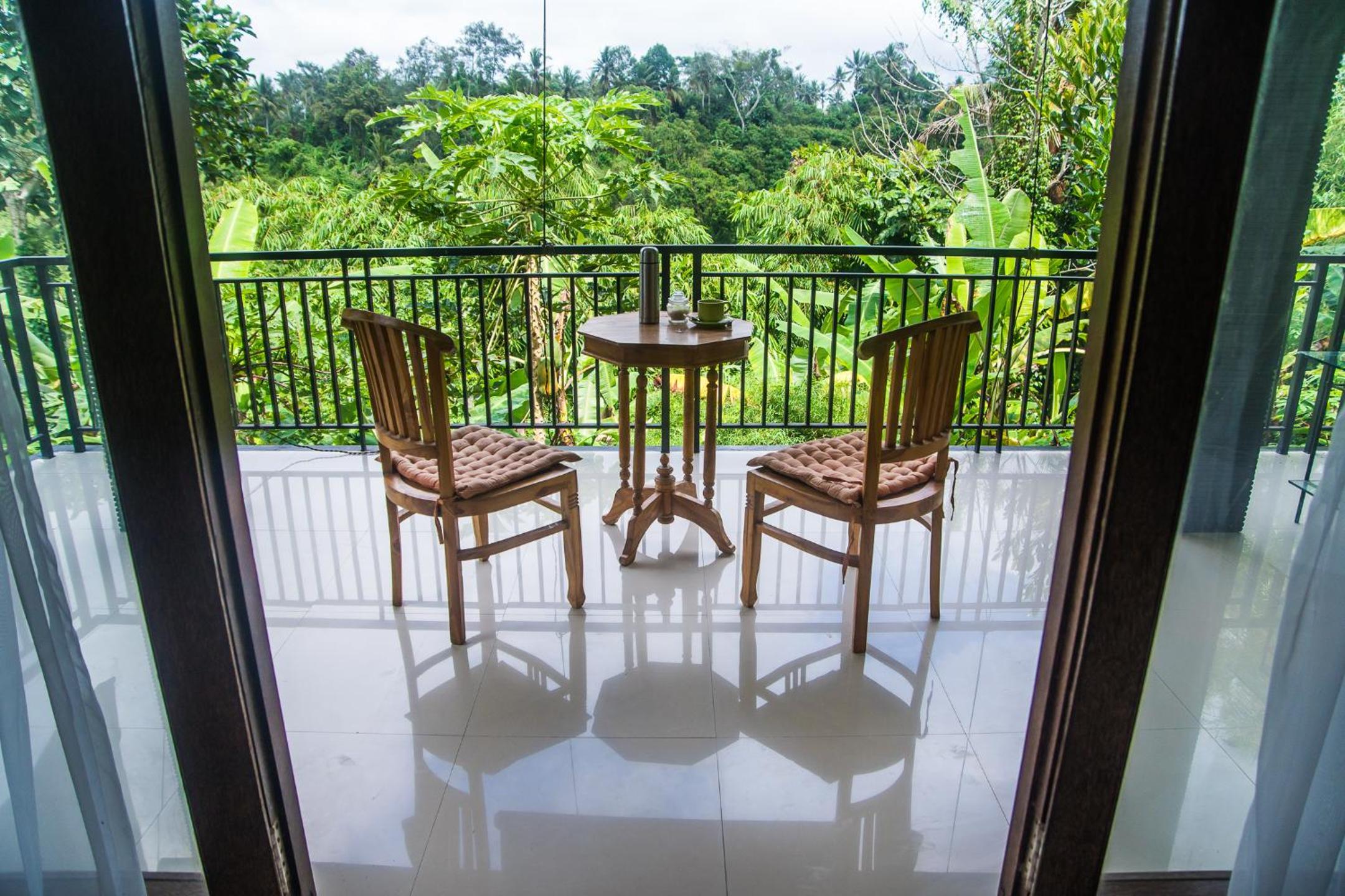 Deluxe Double Room with Balcony - Photo 16