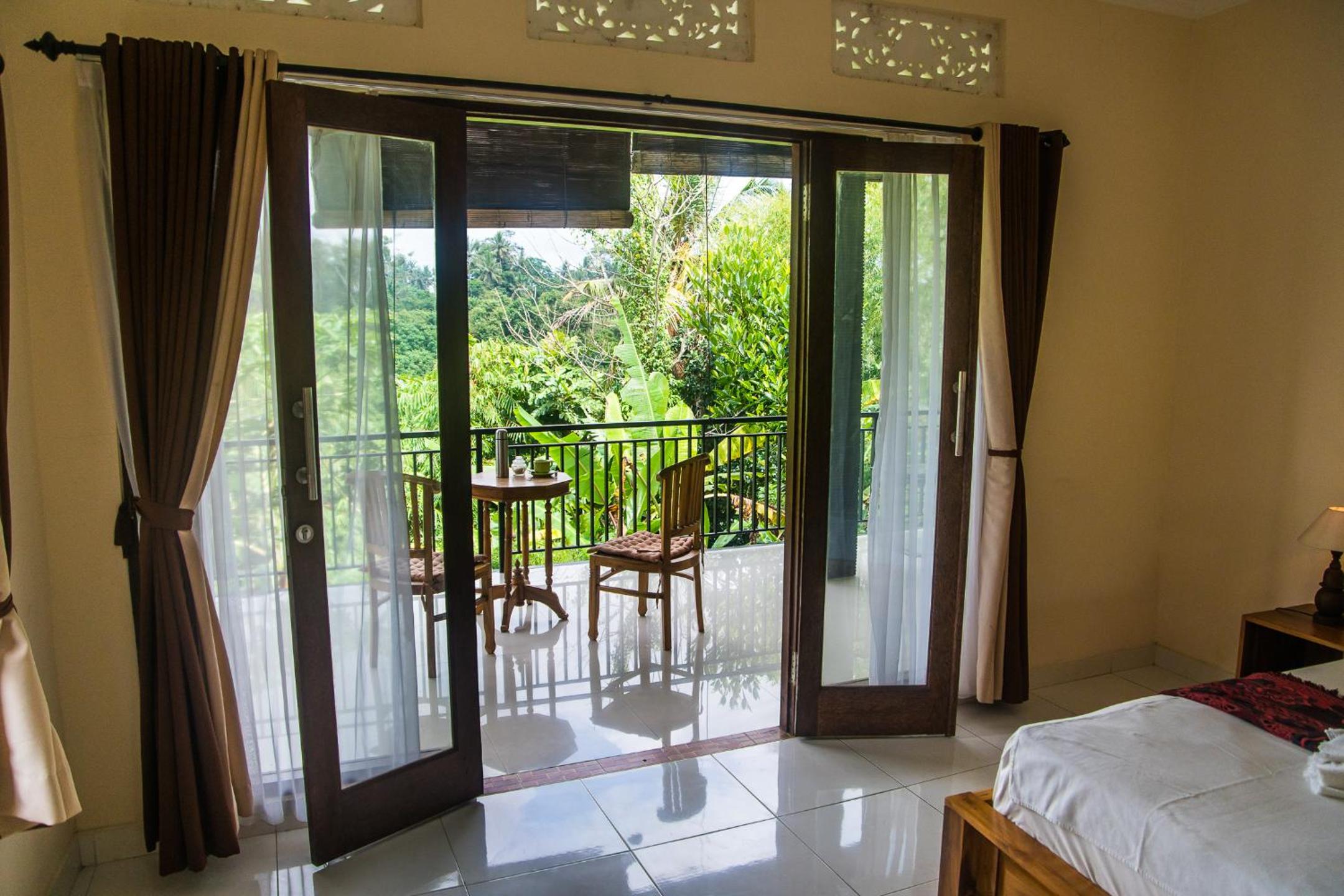 Deluxe Double Room with Balcony - Photo 17