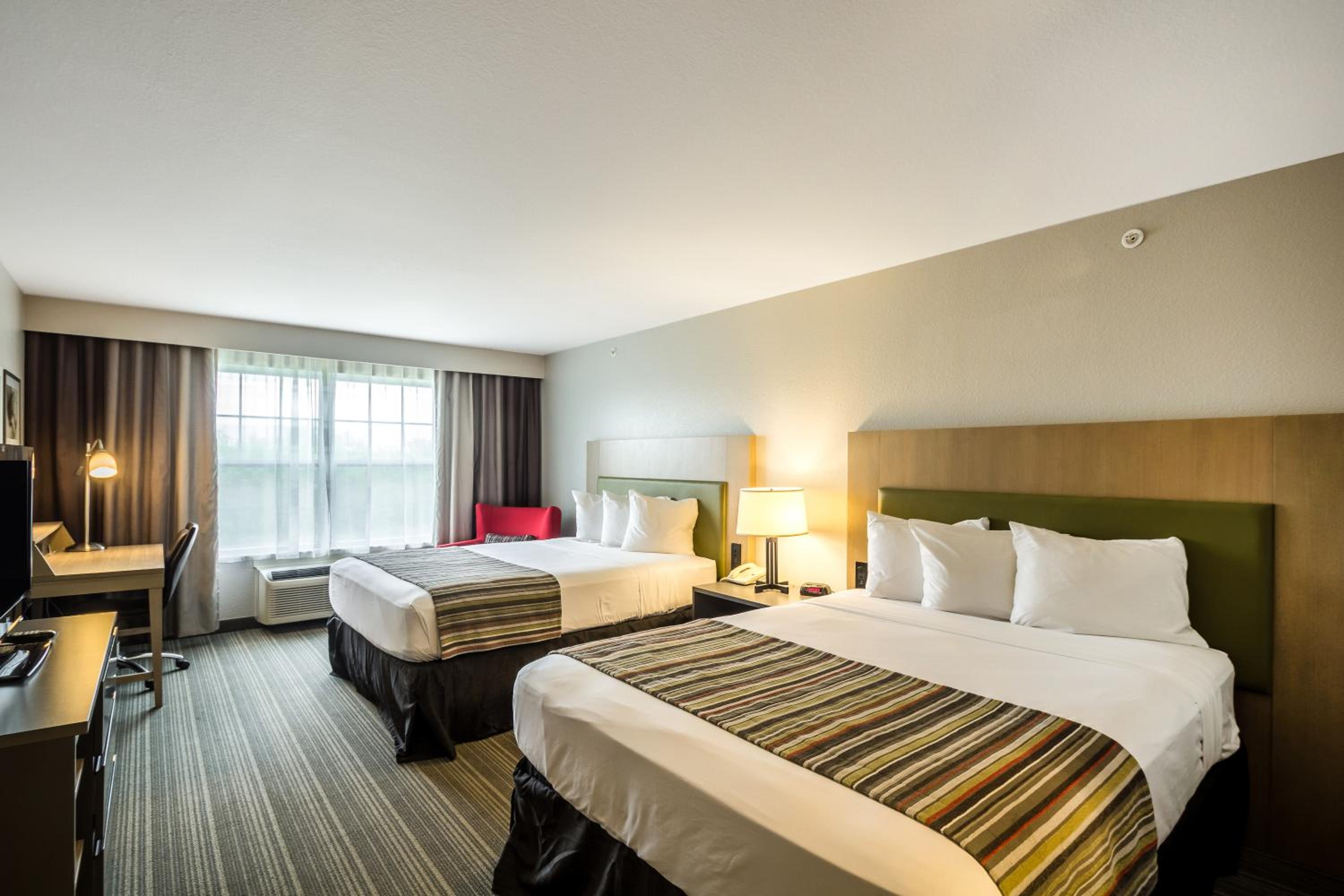 Queen Room with Two Queen Beds - Photo 1