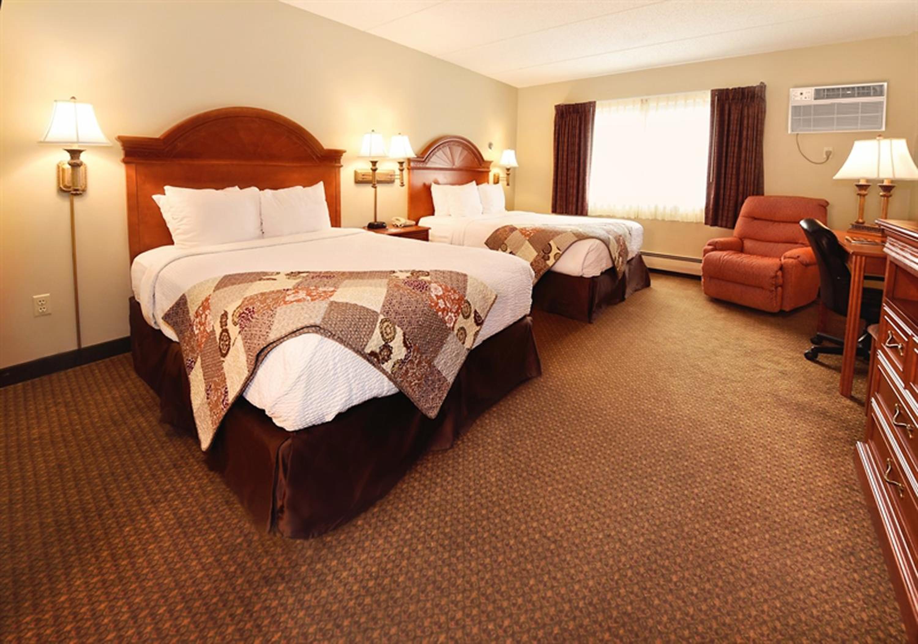 Extended Stay Queen Room in Separate Building - Photo 1