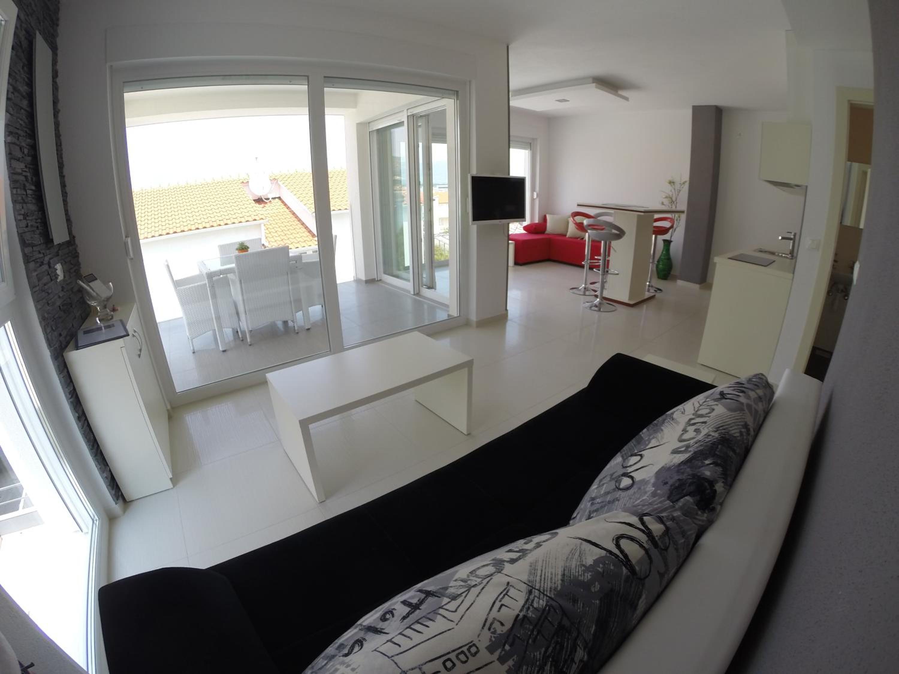 One-Bedroom Apartment with Balcony and Sea View - First Floor