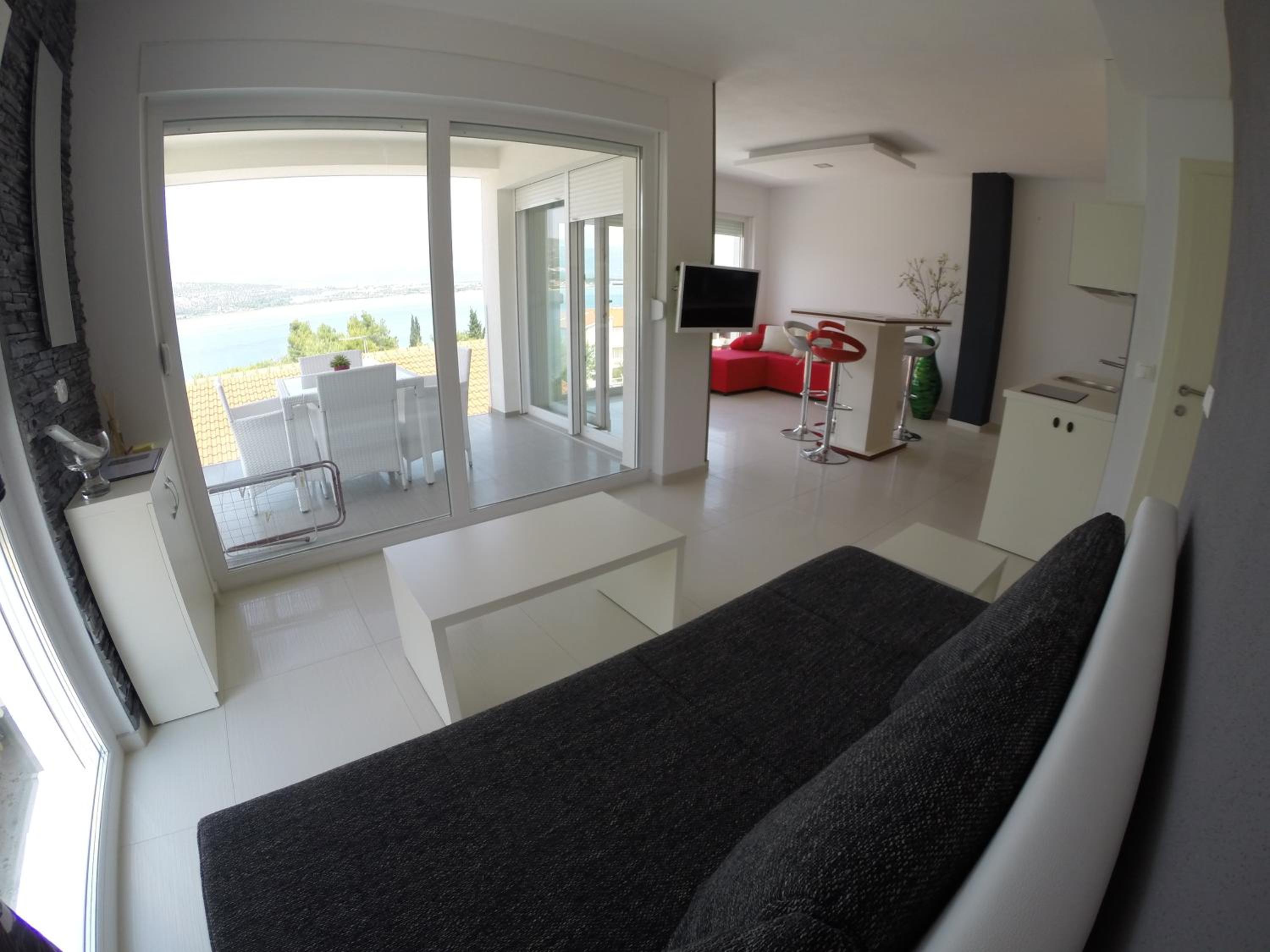 One-Bedroom Apartment with Balcony and Sea View - Second Floor