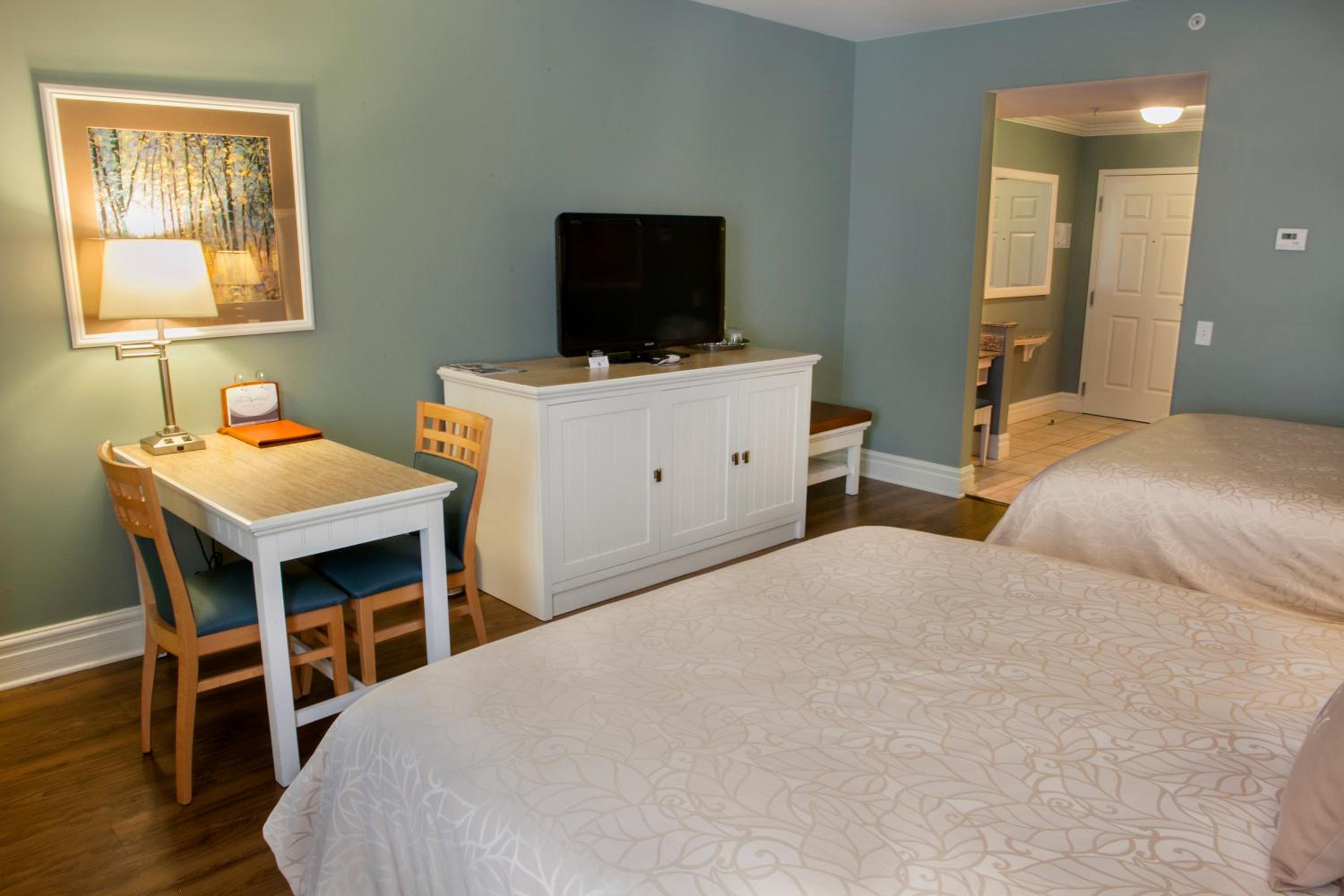 Queen Room with Two Queen Beds with Village View photo 3