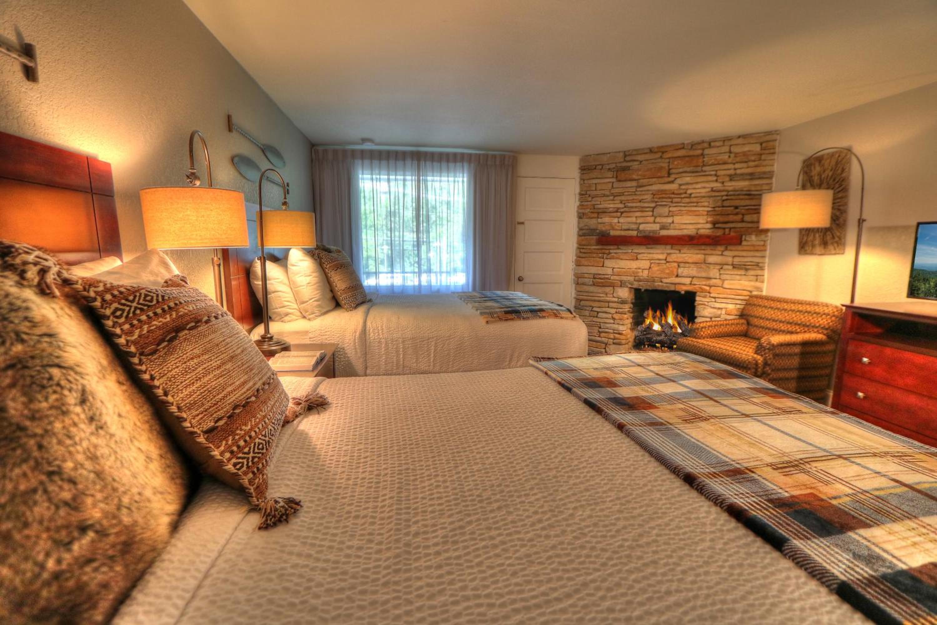 Deluxe Two Queen Beds With Fireplace and Balcony photo 1