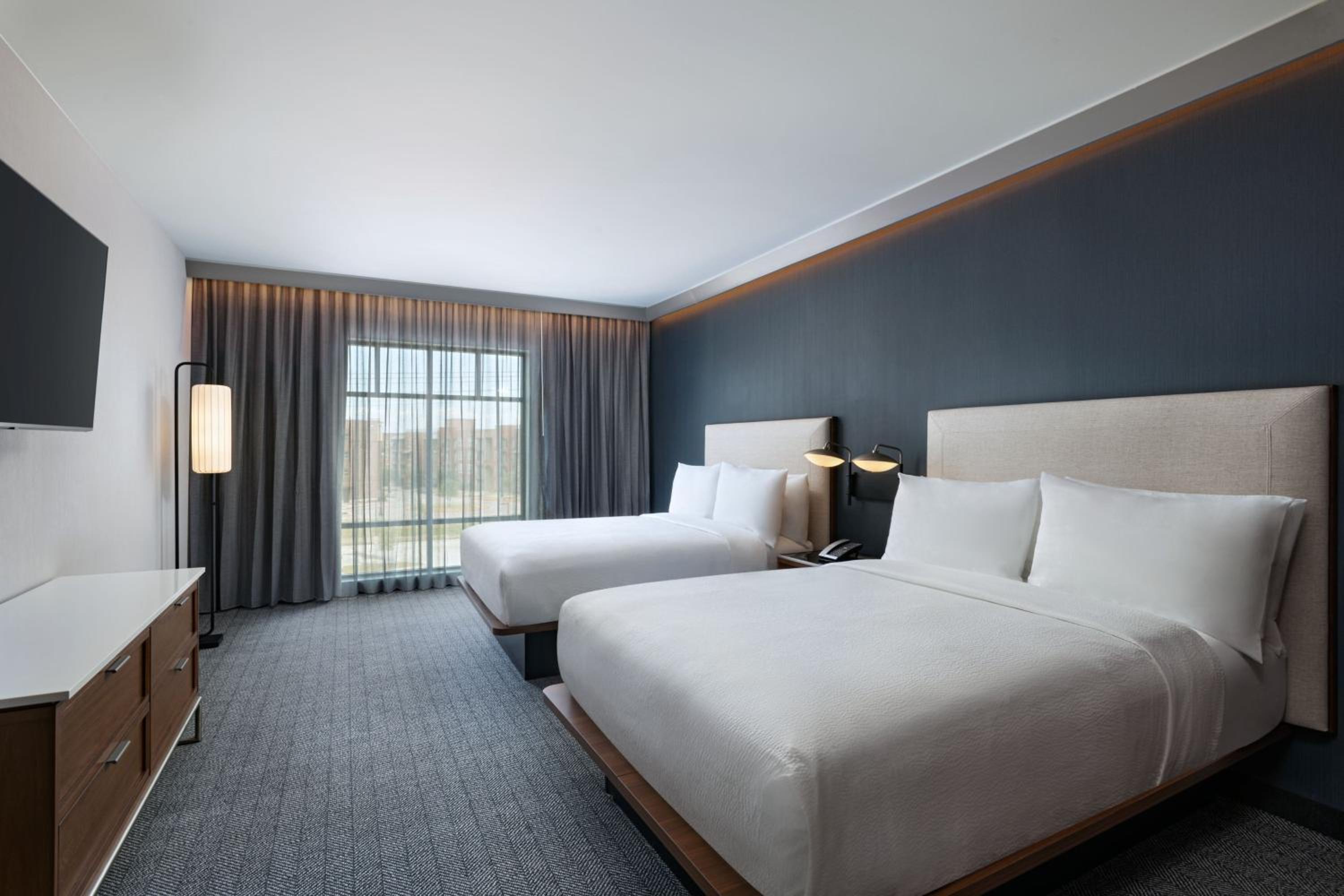 Queen Room with Two Queen Beds and Sofa Bed - Hearing Accessible photo 2