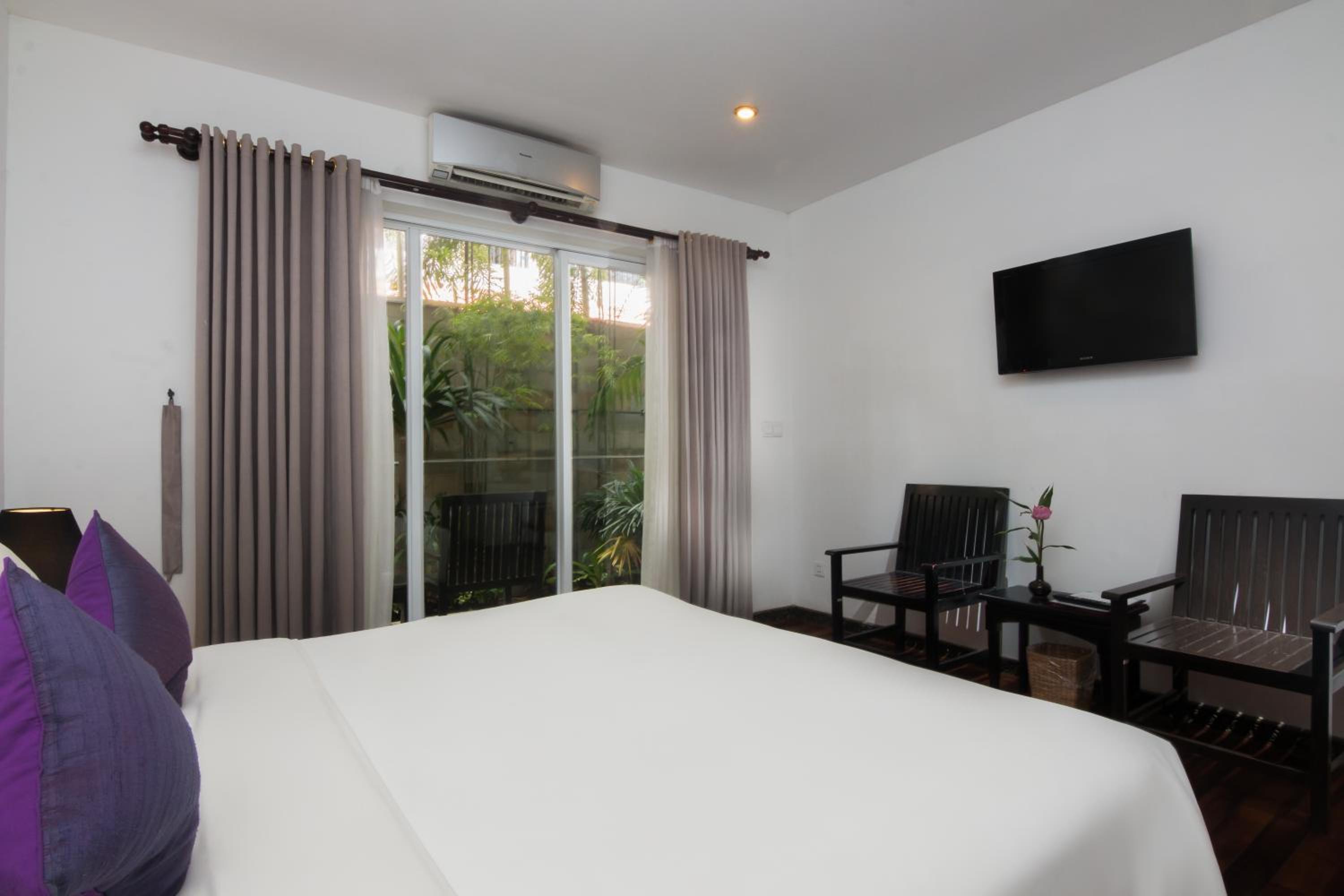 Deluxe Double Room with Balcony - Photo 1