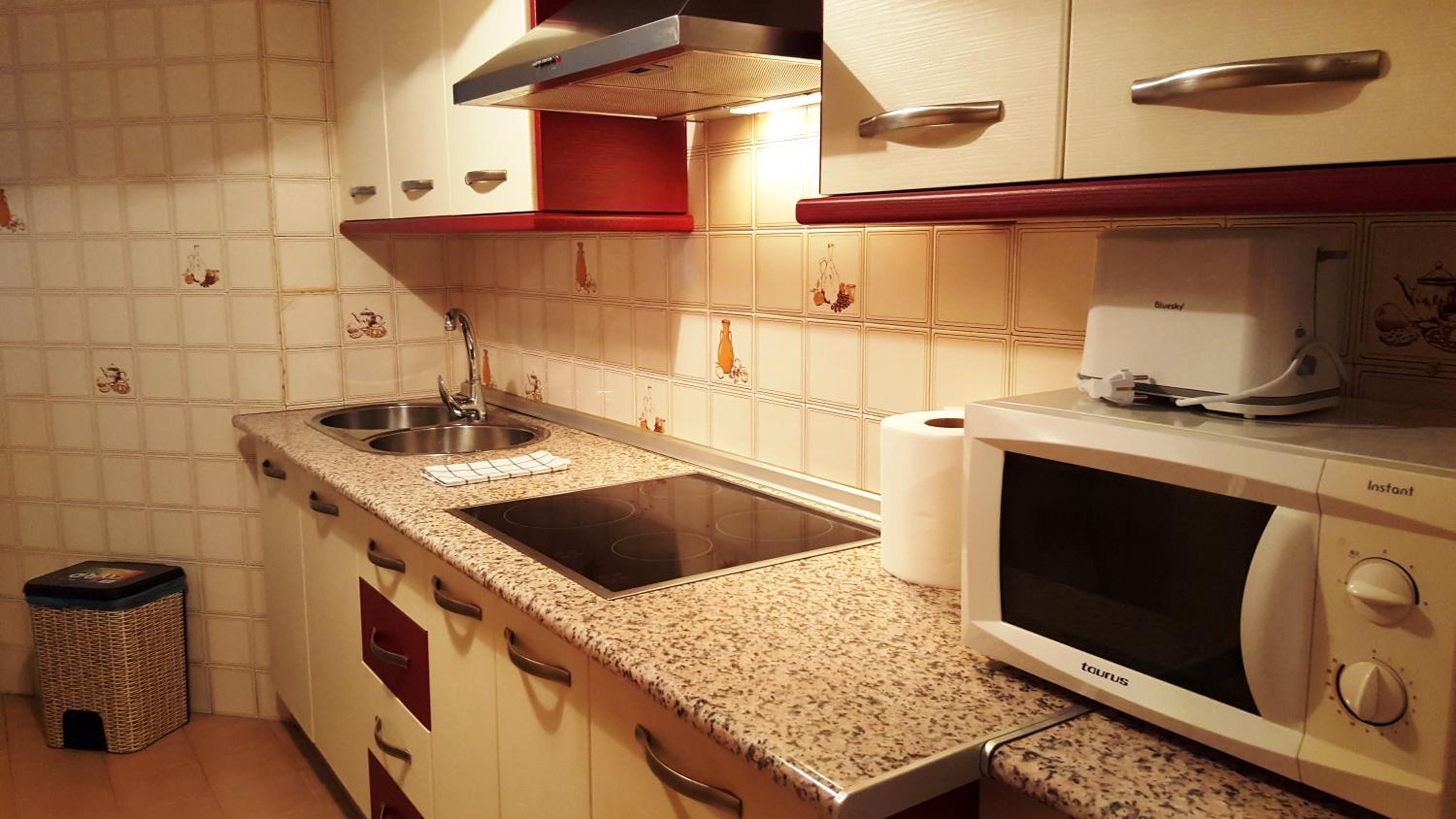 Three-Bedroom Apartment - Photo 19