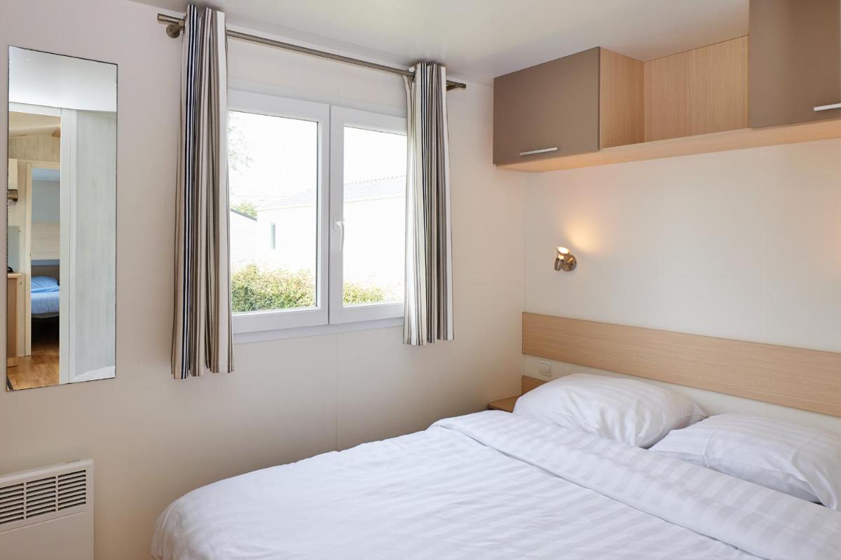 Stacaravan 4 personen (2 slaapkamers) photo 2