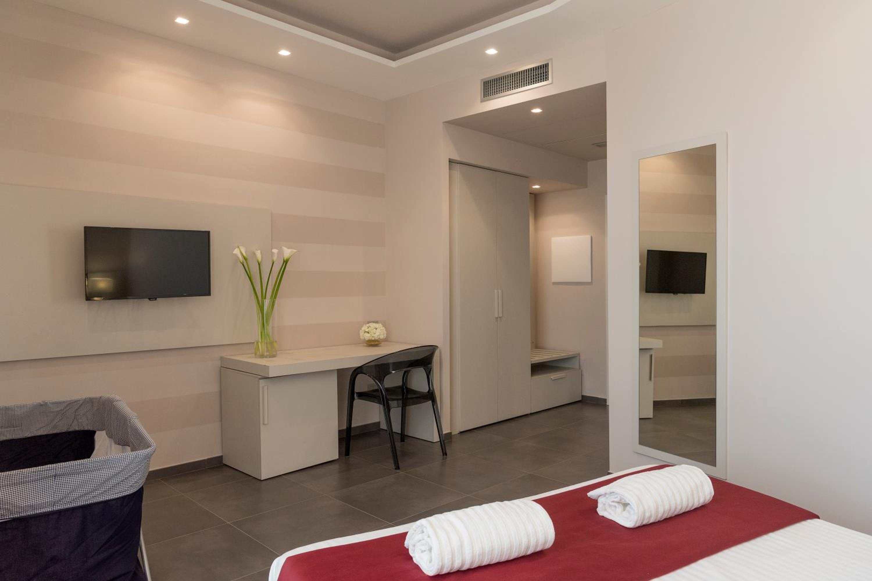 Triple Room (2 Adults + 1 Child) photo 1