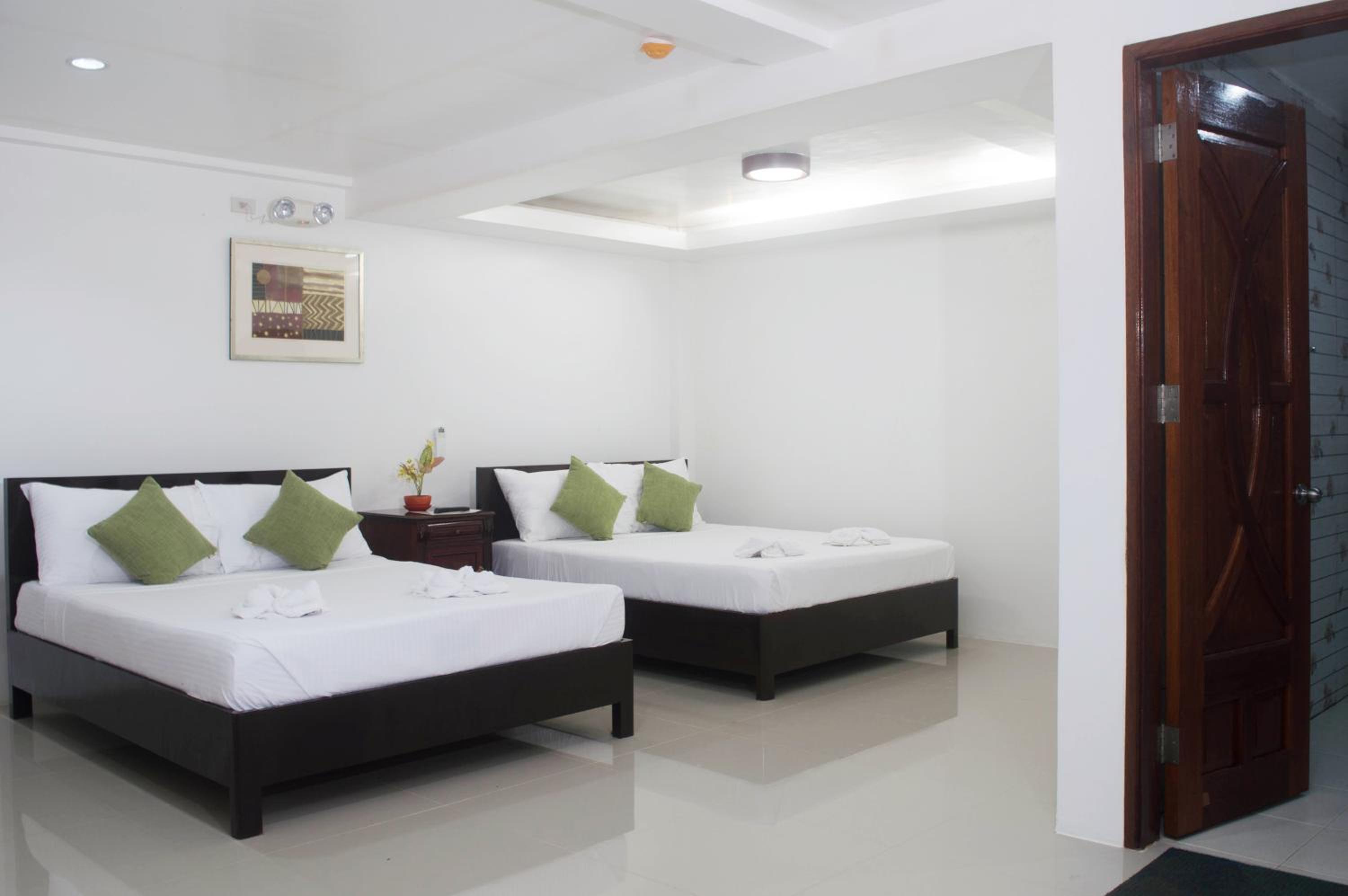 Quadruple Room with Private Bathroom