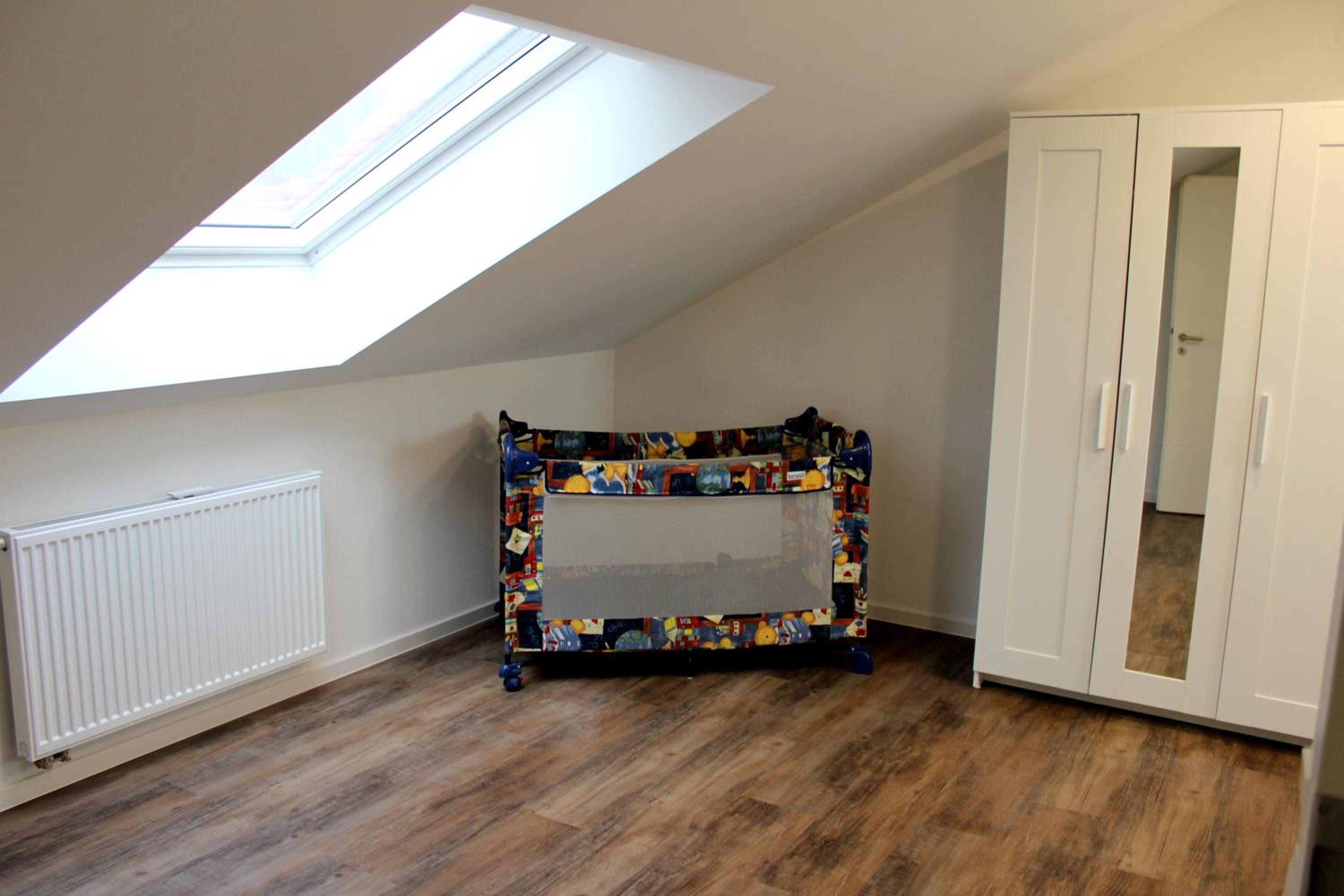 Three-Bedroom House - Photo 12