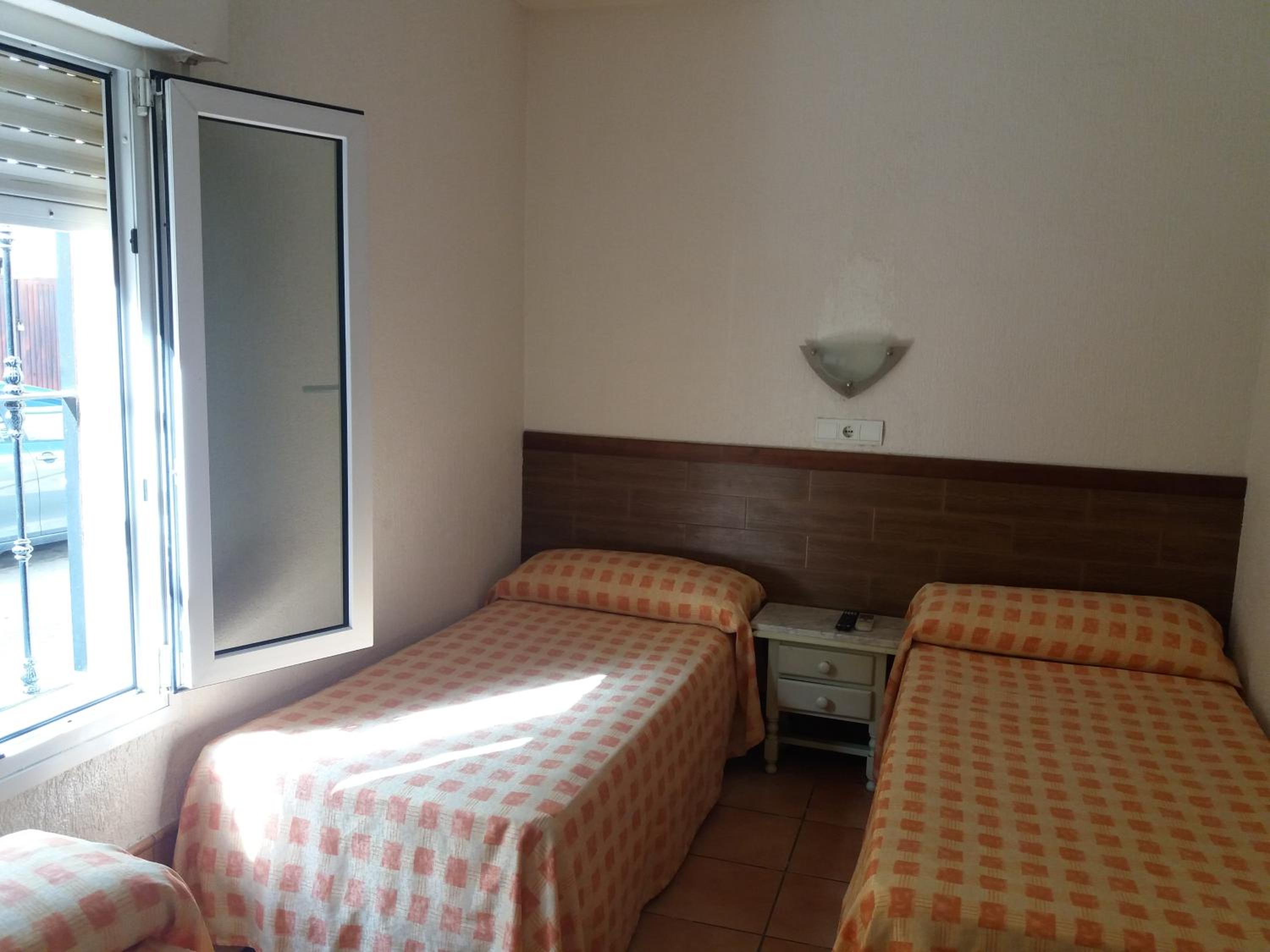 Cama individual en habitación compartida