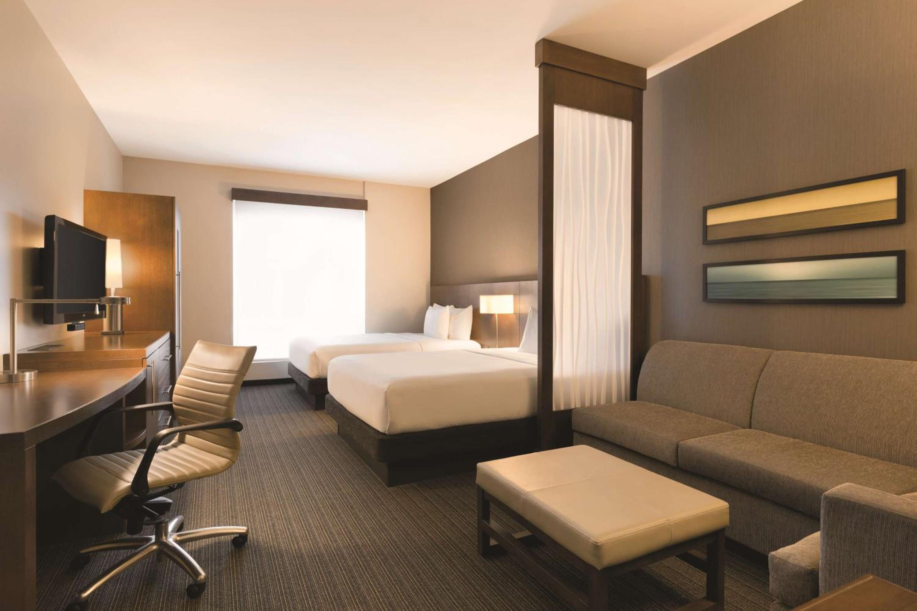 Queen Room with Two Queen Beds and Sofa Bed - Photo 1