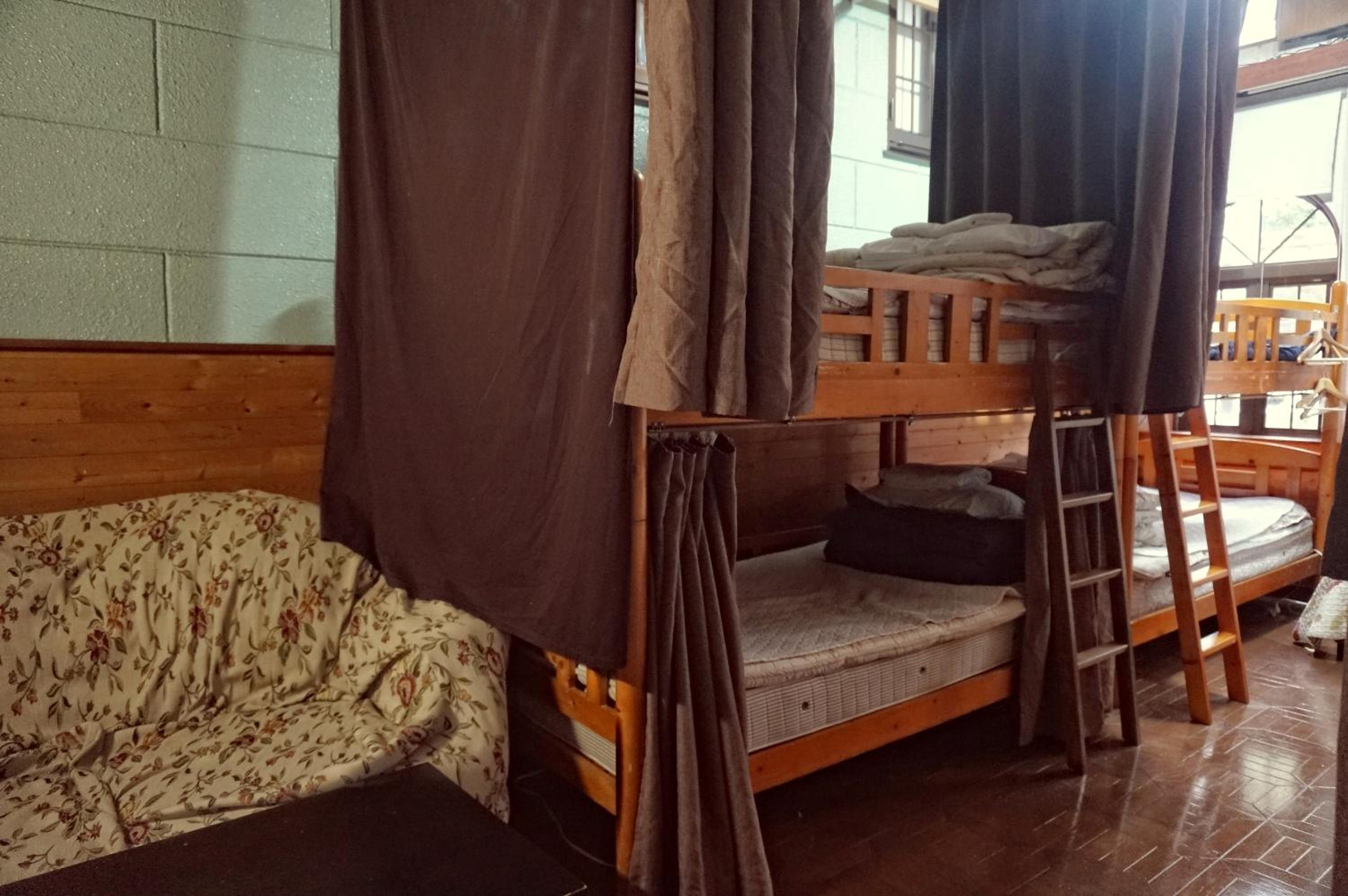 Single Bed in Mixed Dormitory Room (8 Adults)