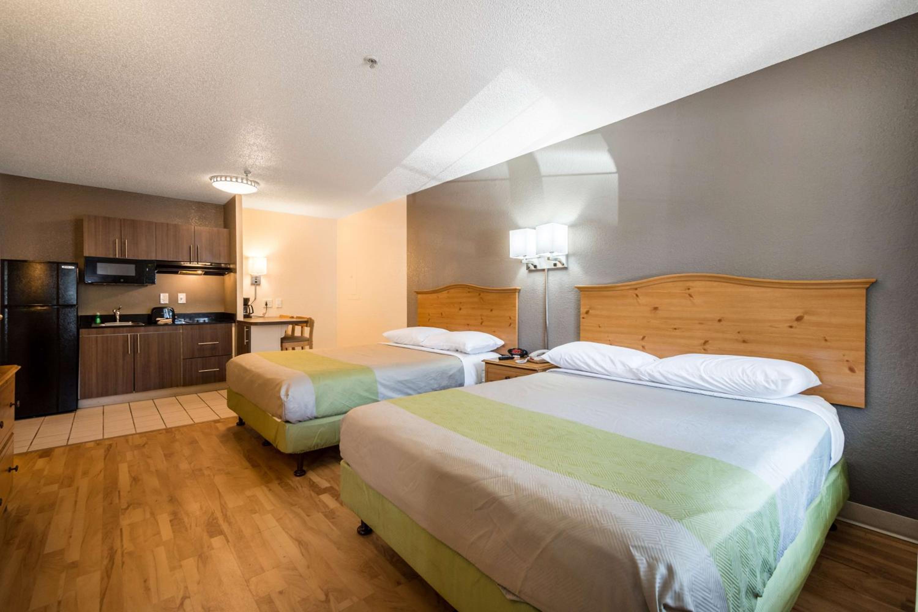 Queen Room with Two Queen Beds - Disability Access - Non-Smoking photo 1