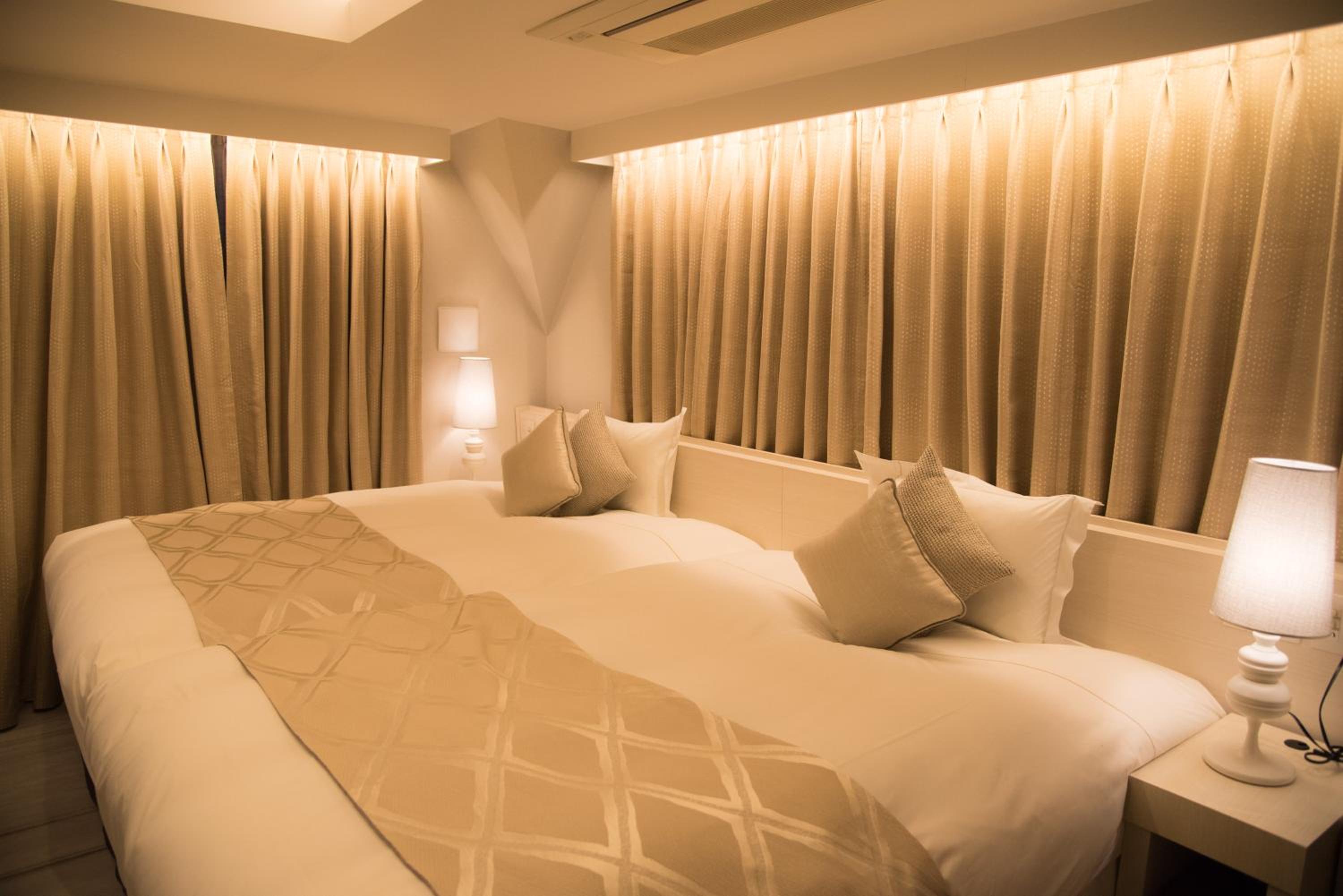 Deluxe Twin Room - Non-Smoking - No Daily Cleaning photo 2