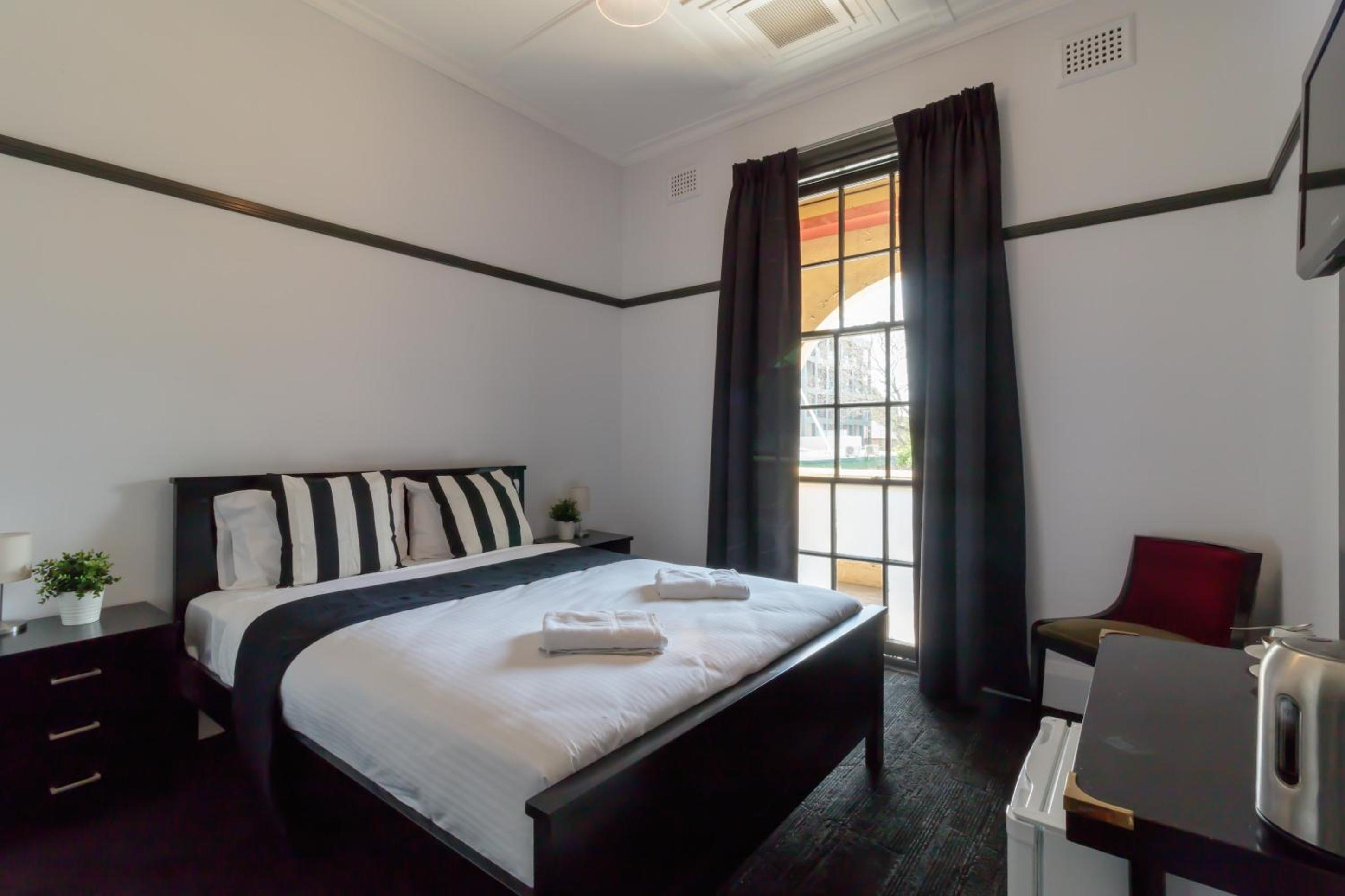 Queen Room with Shared Bathroom