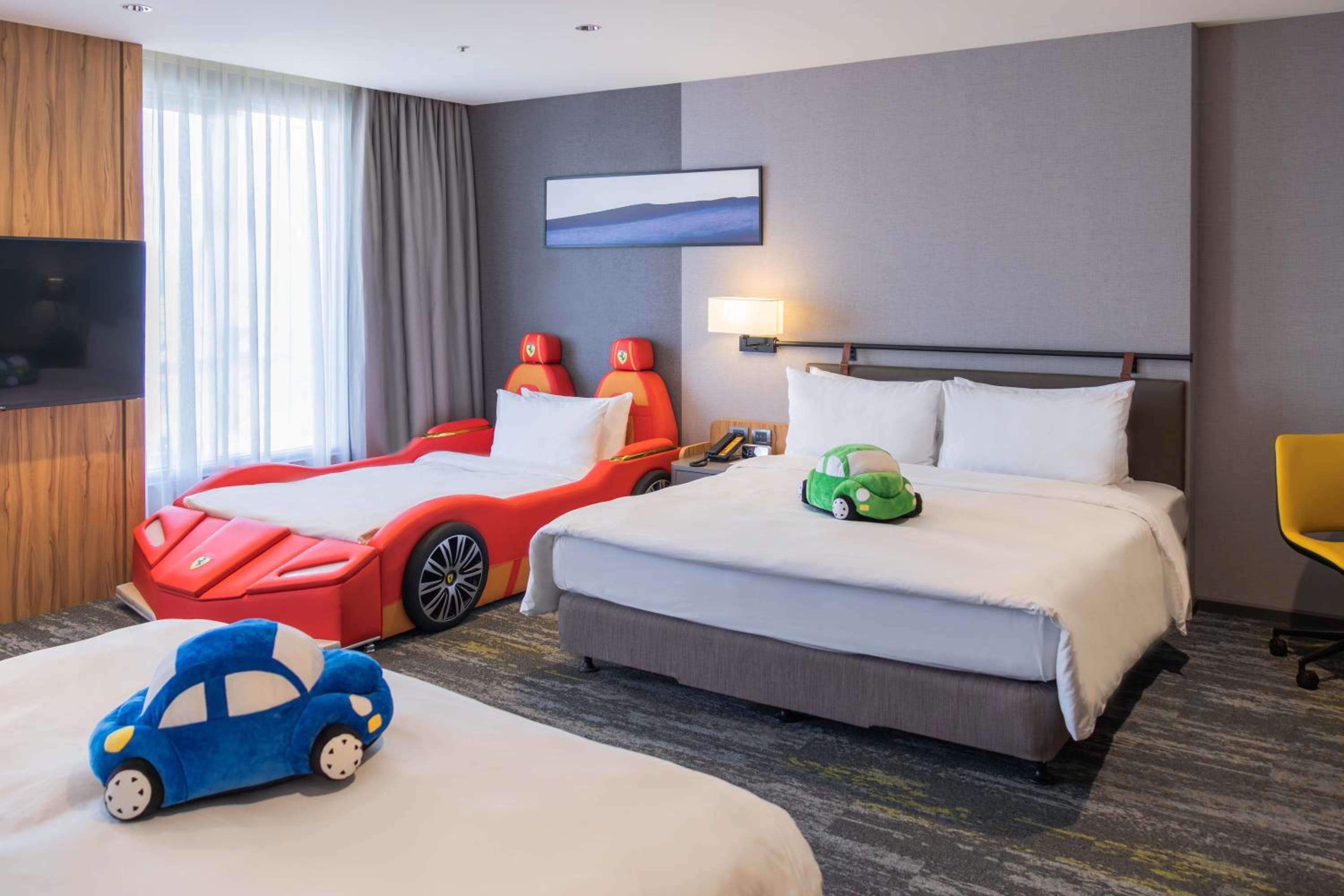 Grand Room with Two King Beds and One Twin Bed - Kids Theme