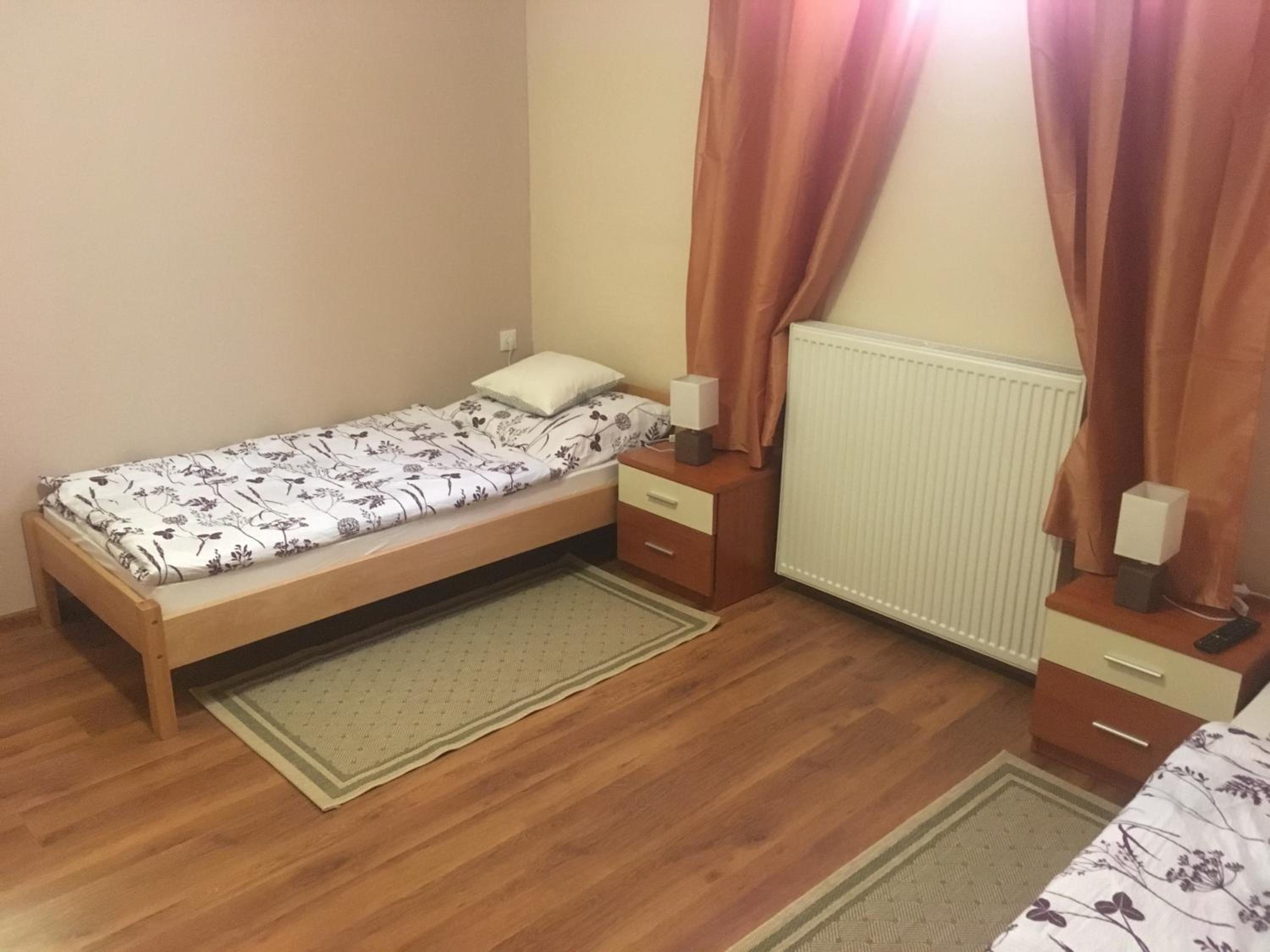 Three-Bedroom Apartment - Photo 4