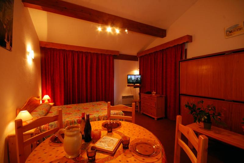 Comfort Quadruple Studio with Balcony & Mountain View (2 Adults & 2 Children)