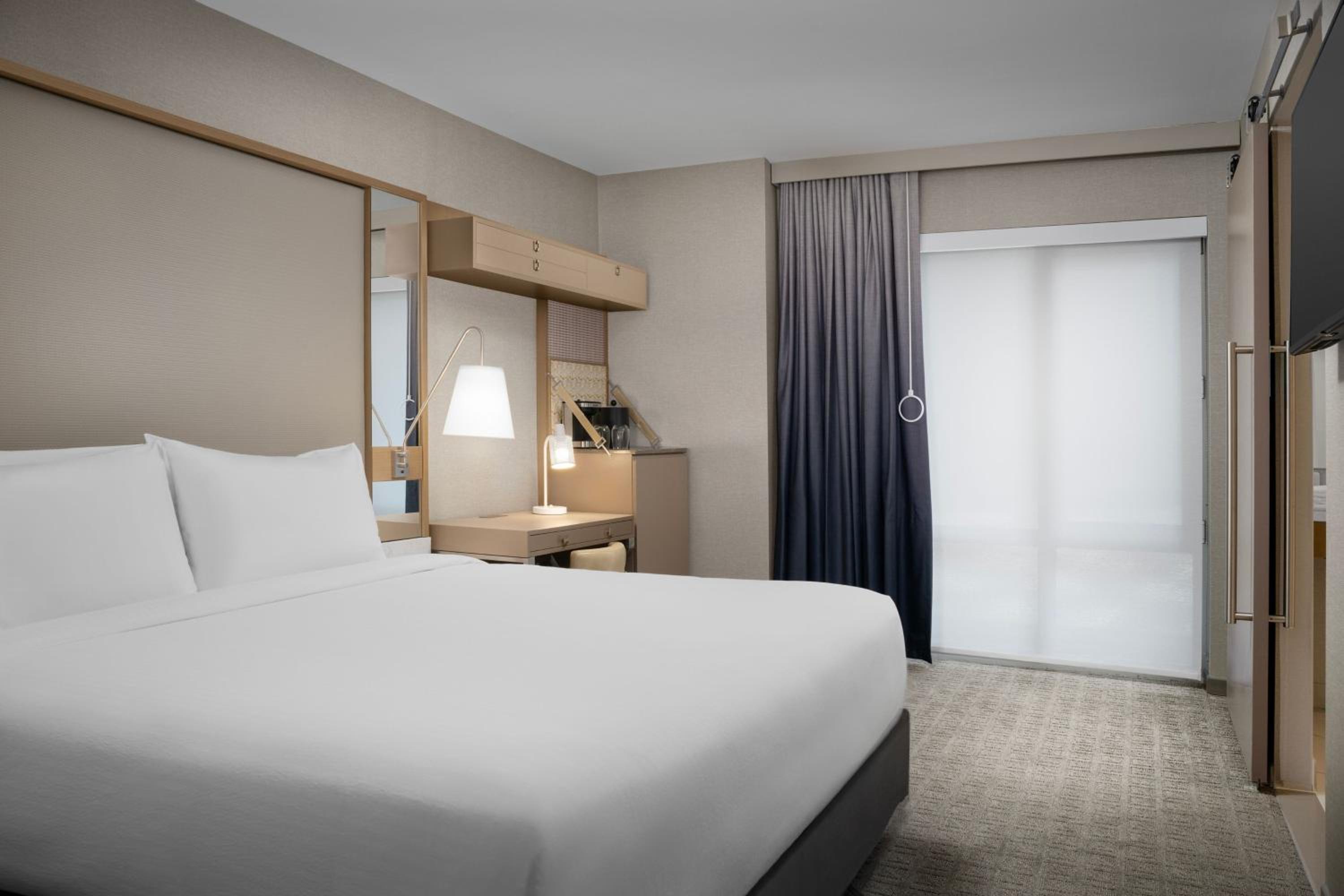 King Suite with City View and Roll-In Shower - Mobility Access