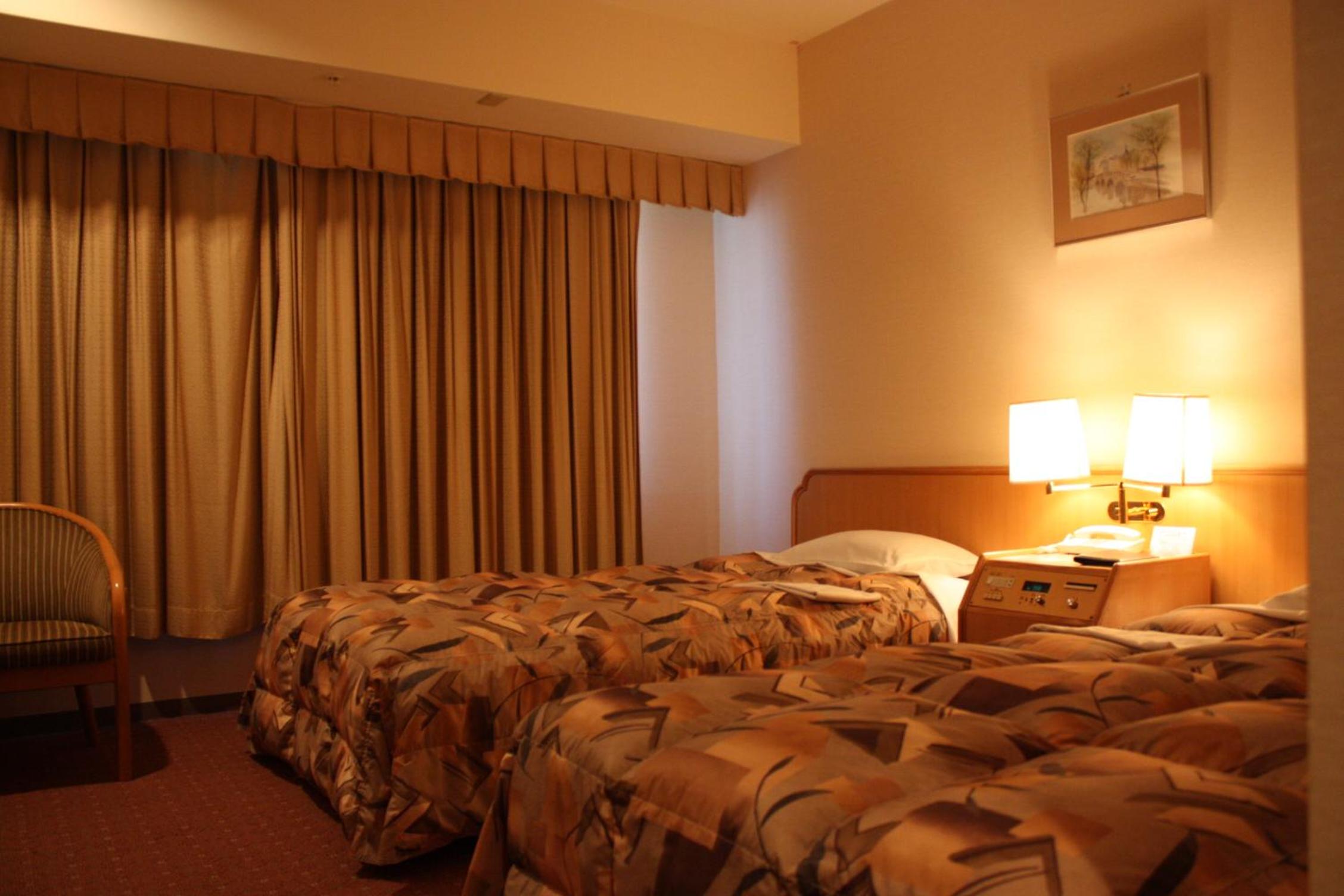 Twin Room - Non-Smoking - Photo 1