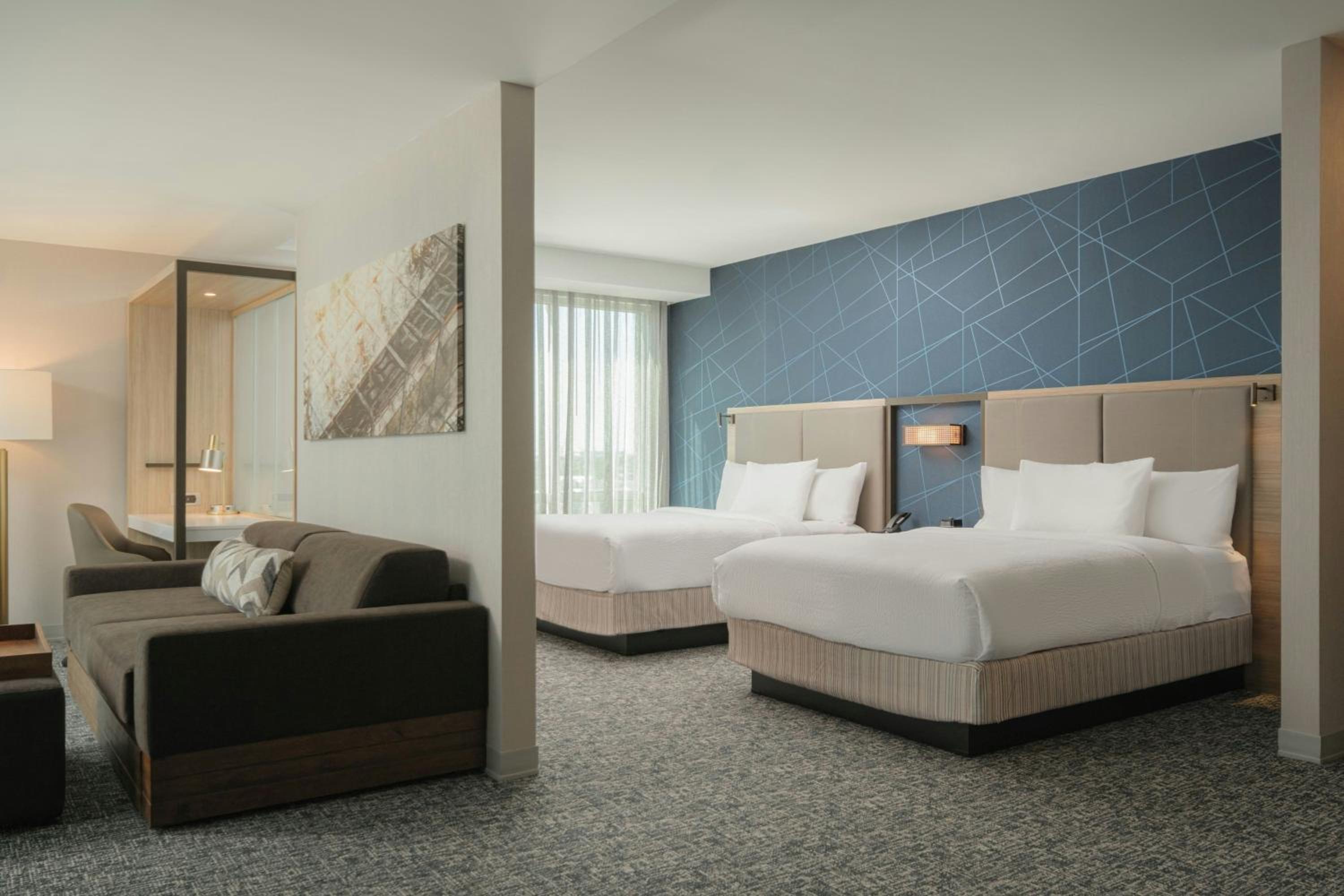 Larger Queen Suite with Two Queen Beds, Bathtub and Trundle Sofa - Mobility Access