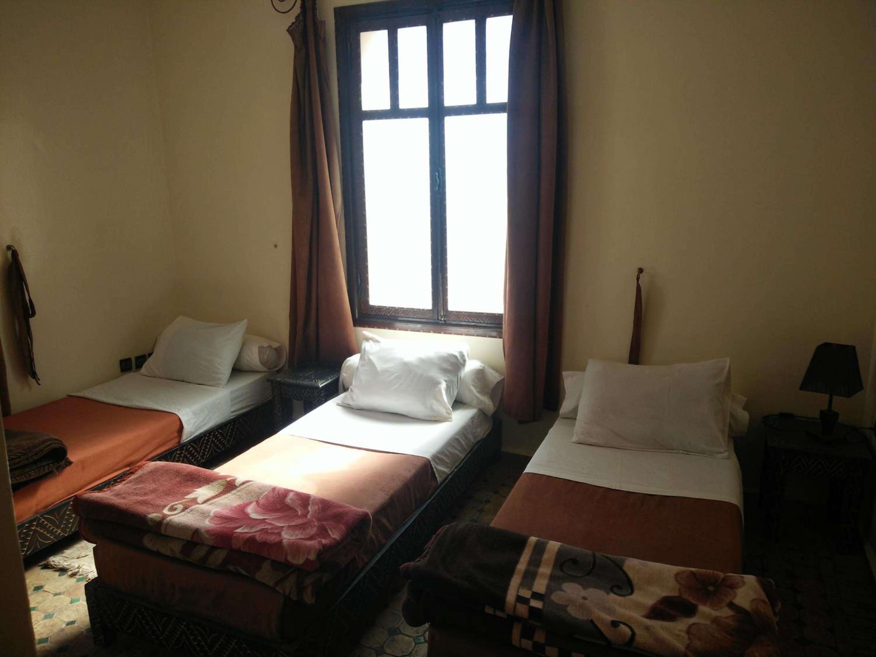 Triple Room with Private Bathroom - Photo 1