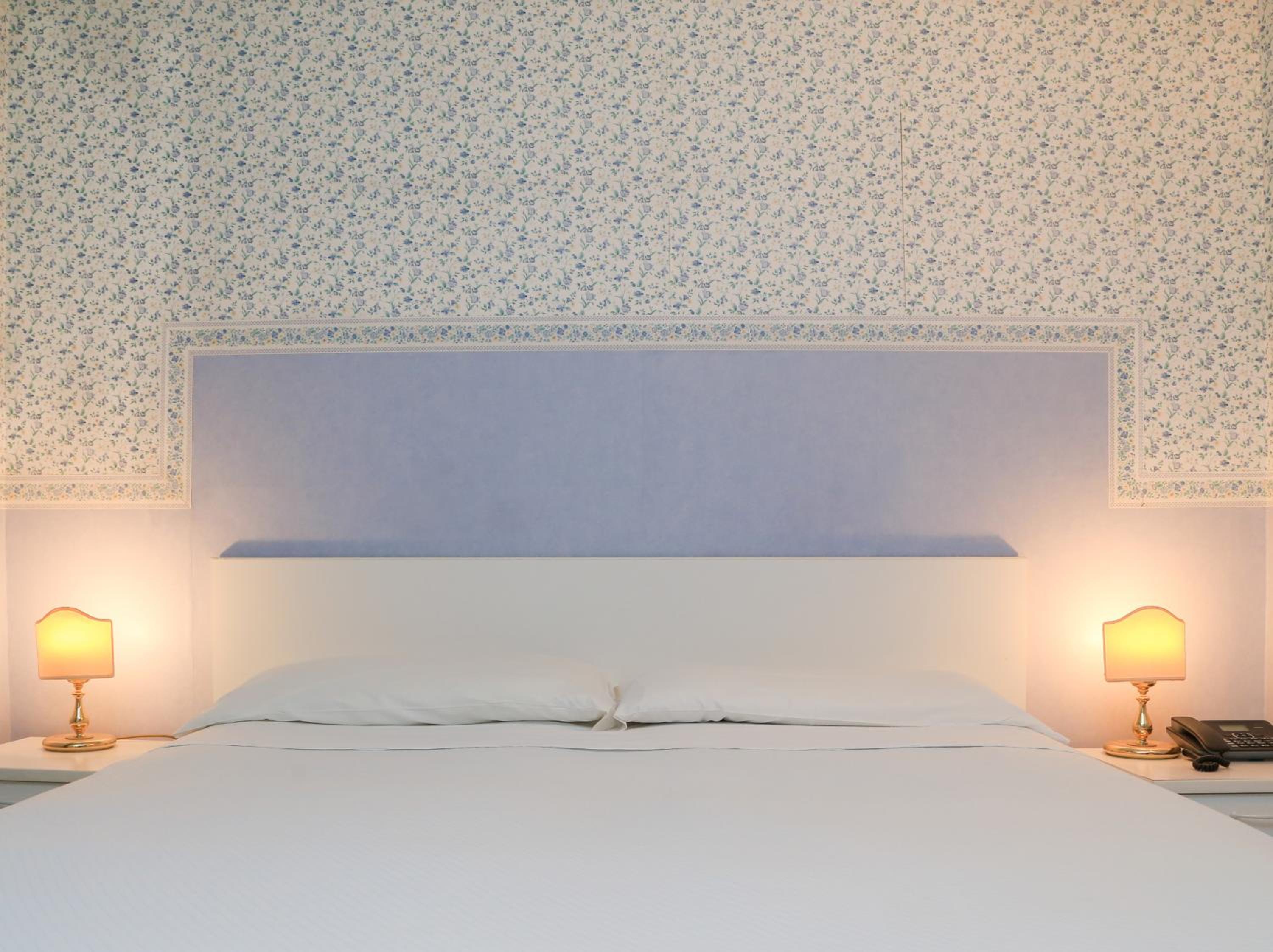 Relax in our cozy, charming sleeping space.