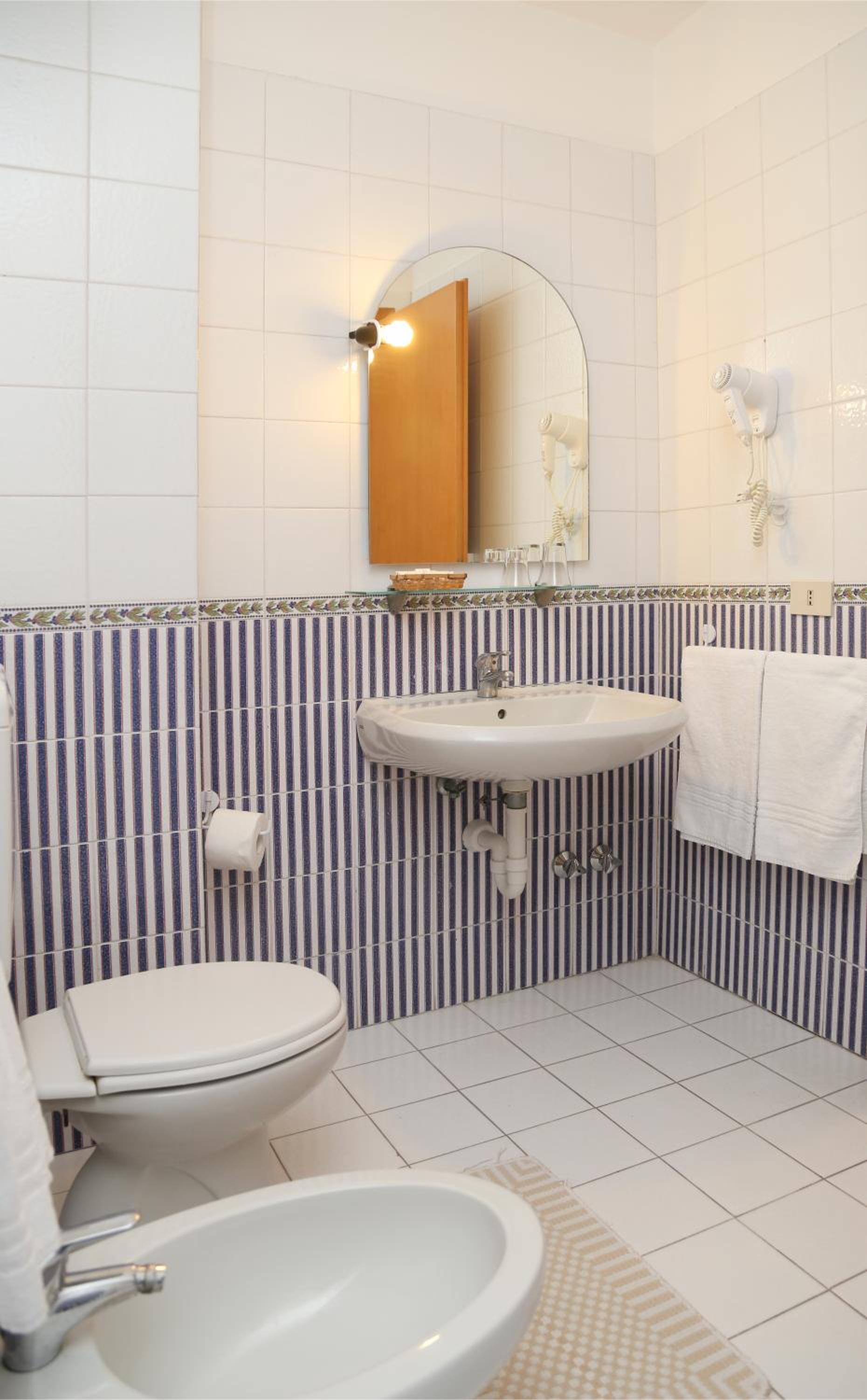 Refresh in our stylish and serene bathroom retreat.