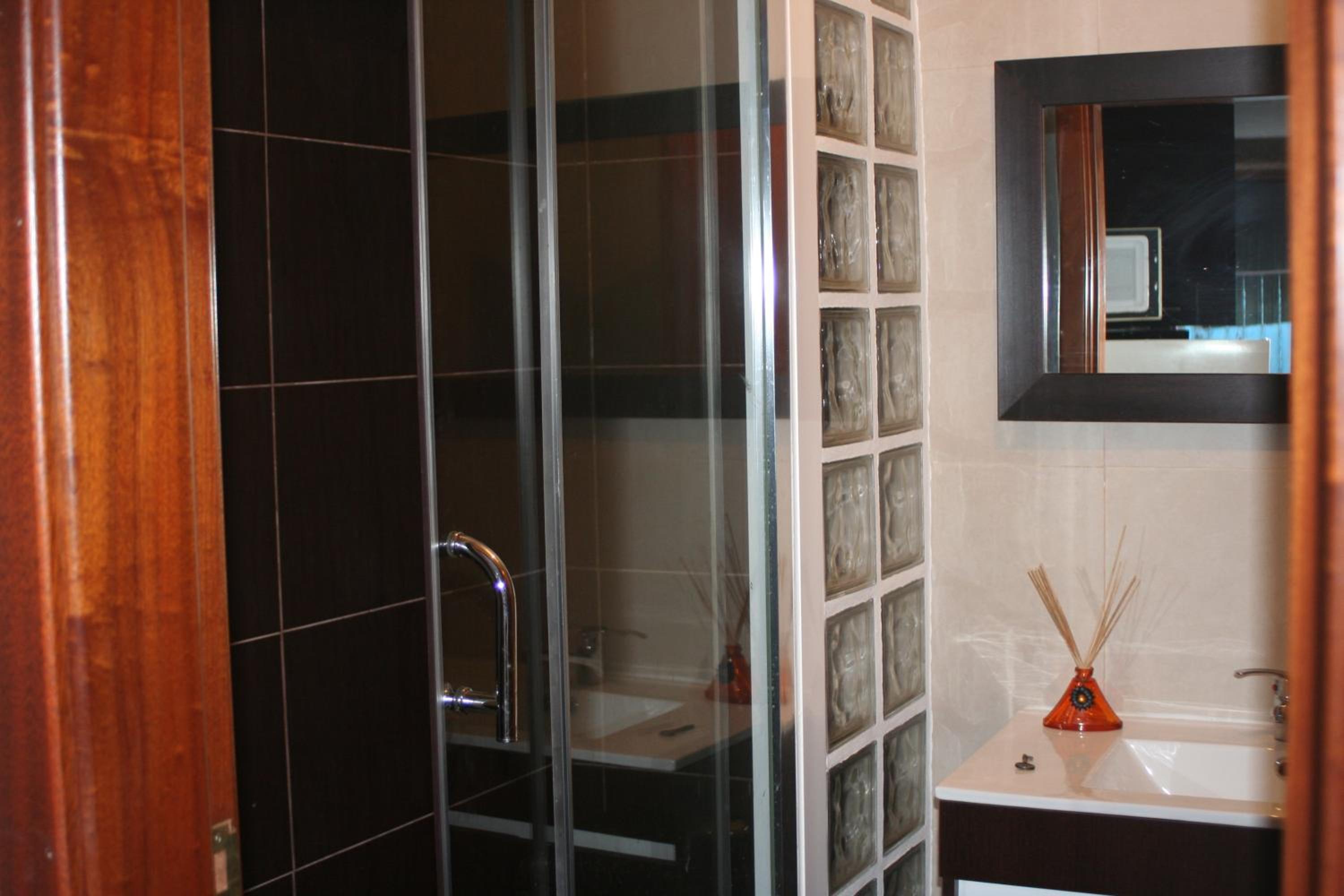 Three-Bedroom House - Photo 36