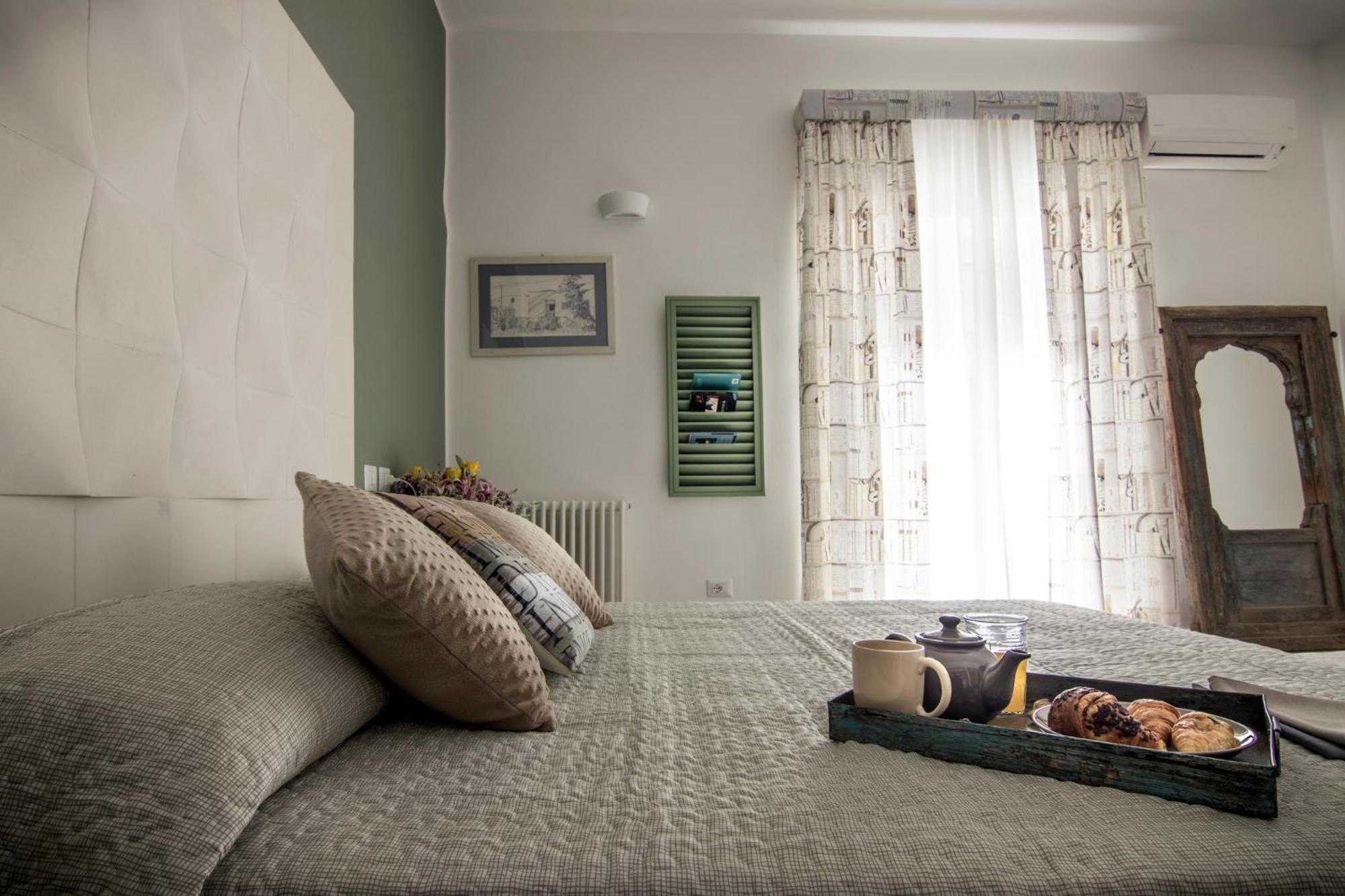 Quadruple Room with Balcony photo 2