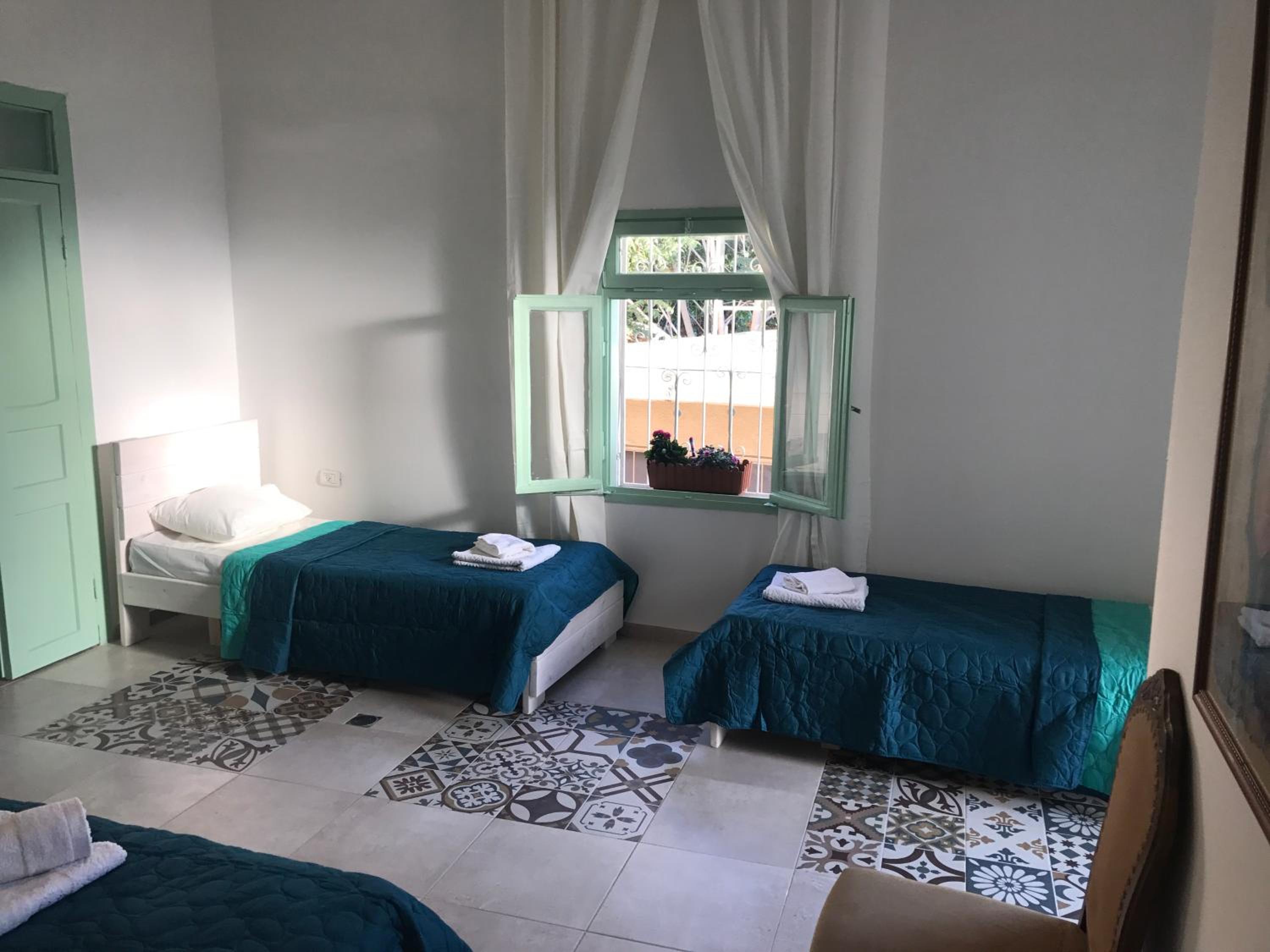 Quadruple Room with Balcony photo 3