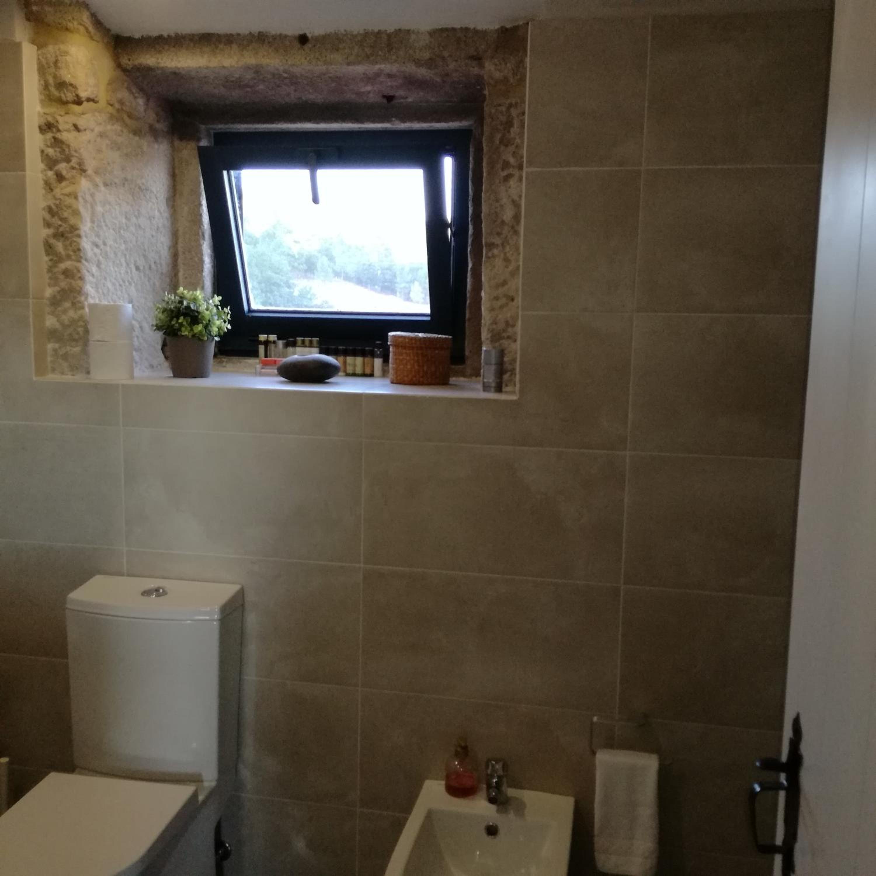 Three-Bedroom House - Photo 53