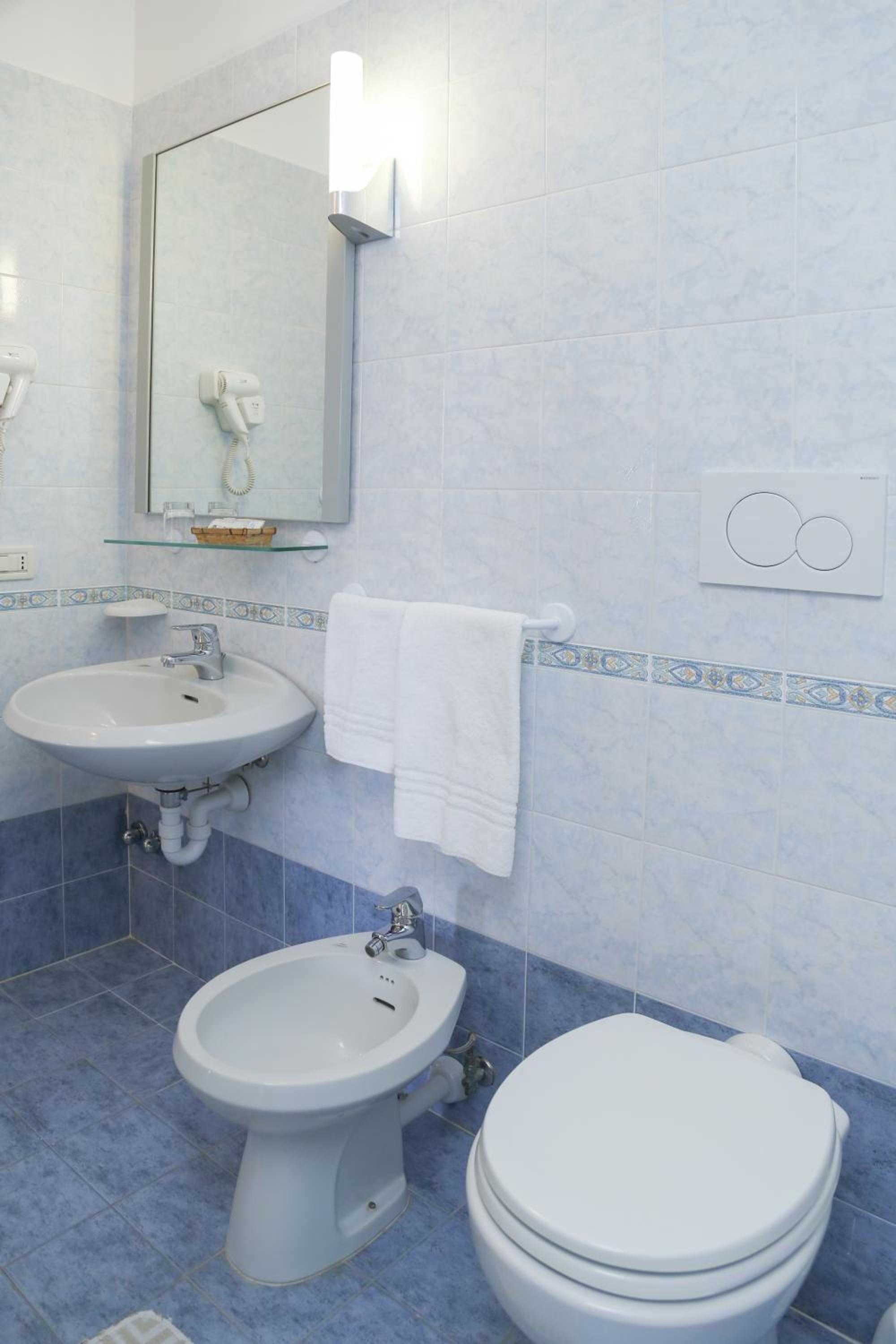 Relax in a serene and stylish bathroom retreat.