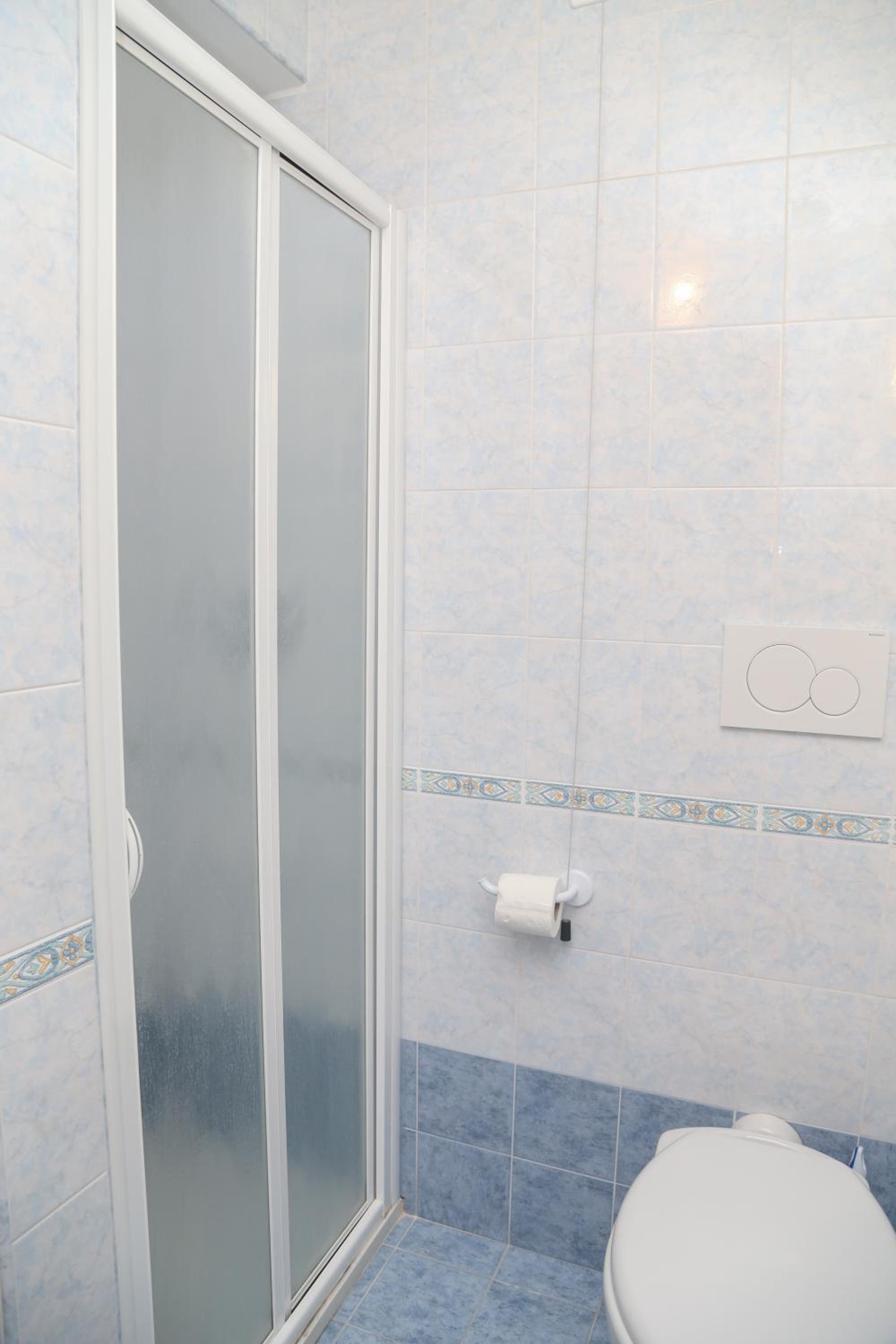 Relax in a bright and airy bathroom sanctuary.