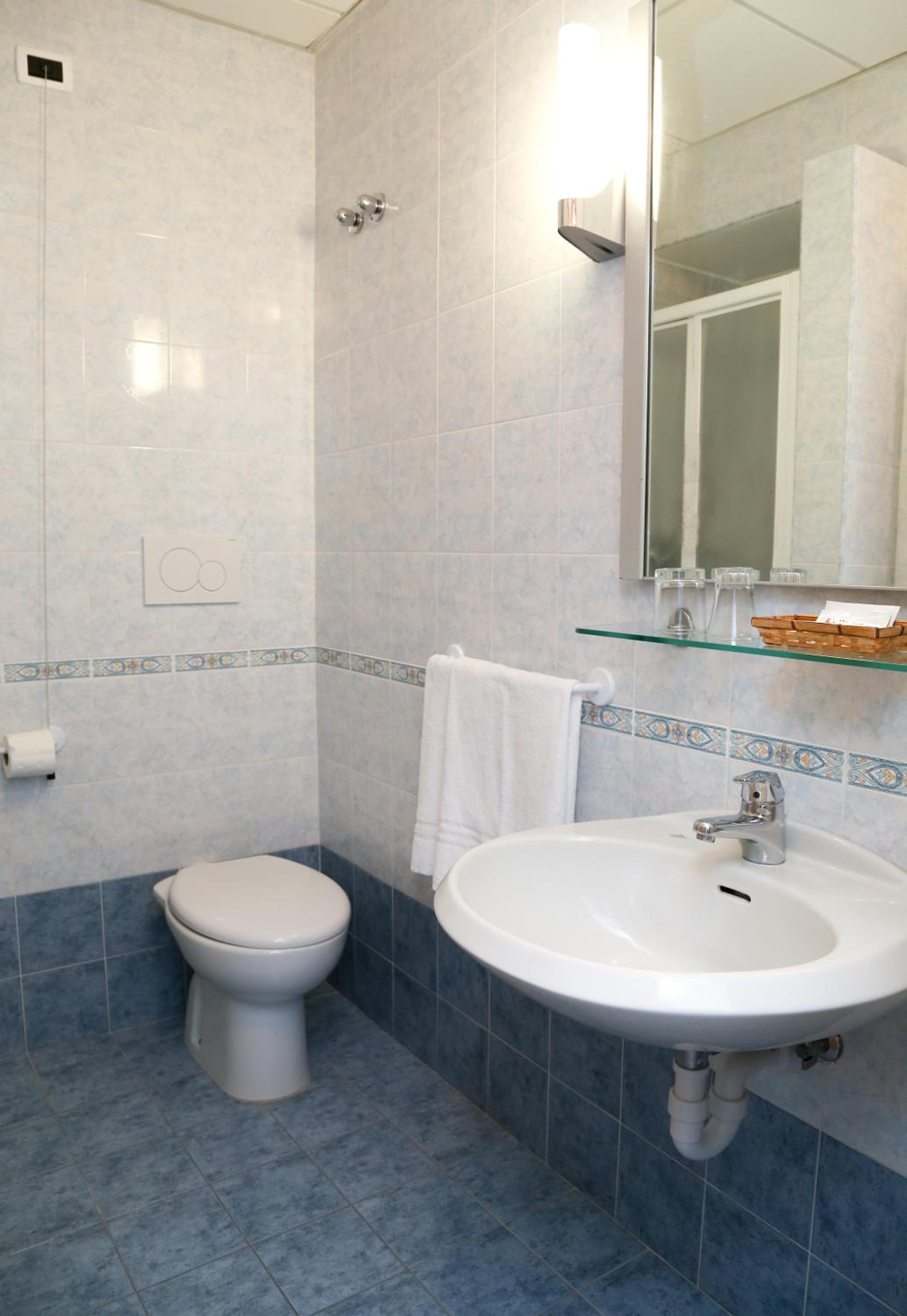 Refresh in our serene and stylish bathroom space!