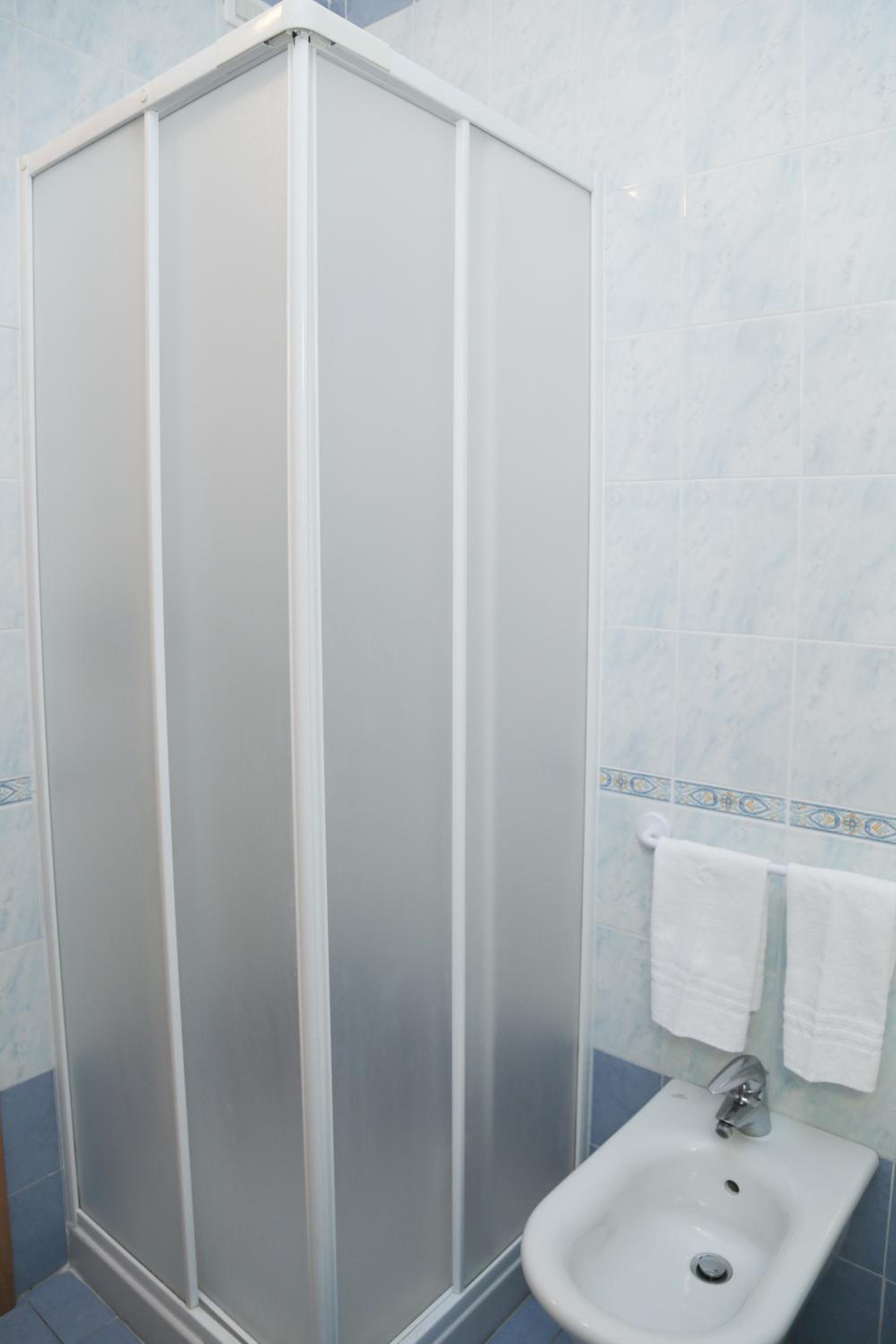 Refresh and unwind in this bright, modern bathroom!